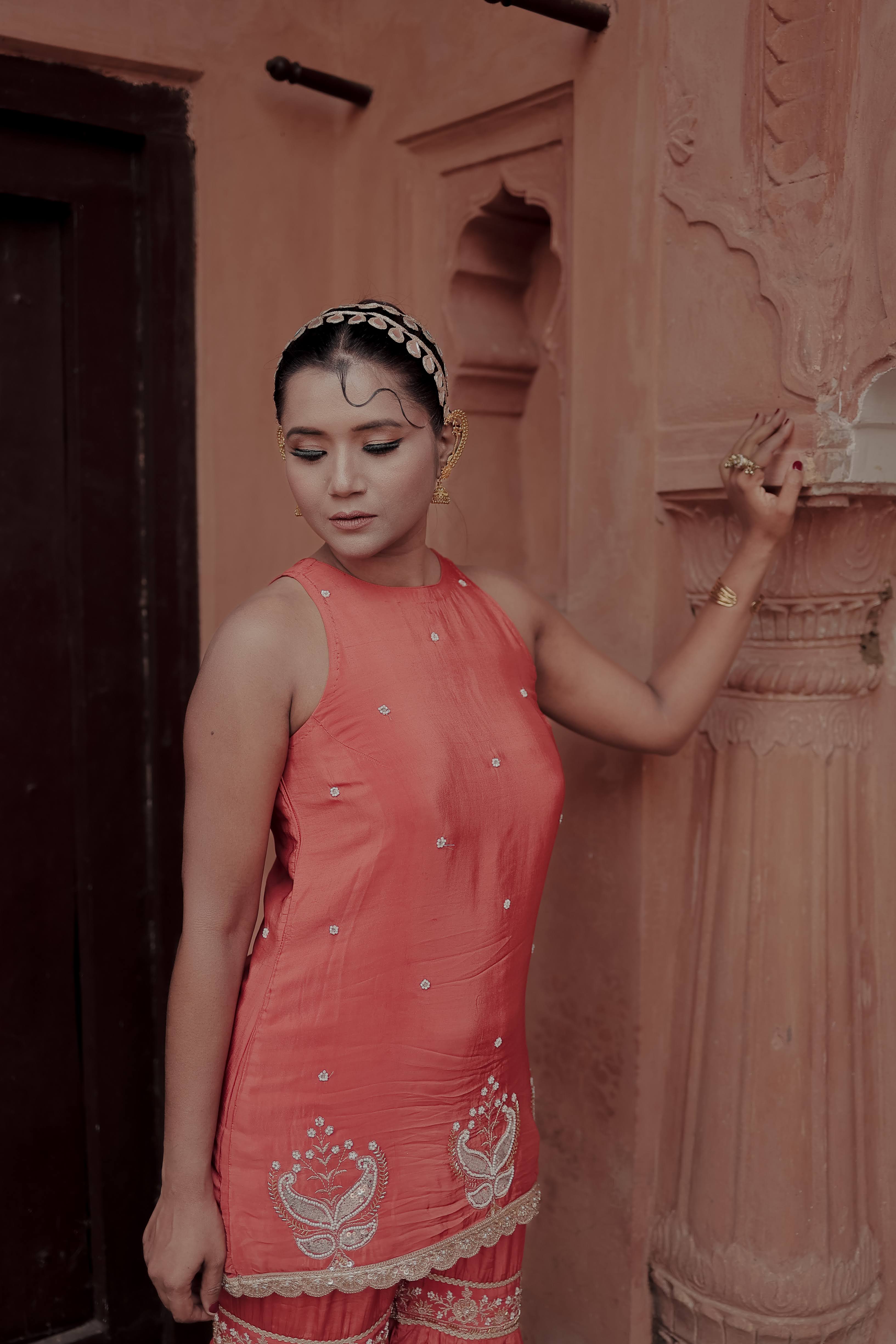 Orange Crepe Silk Sleeveless Suit with Gharara & Dupatta