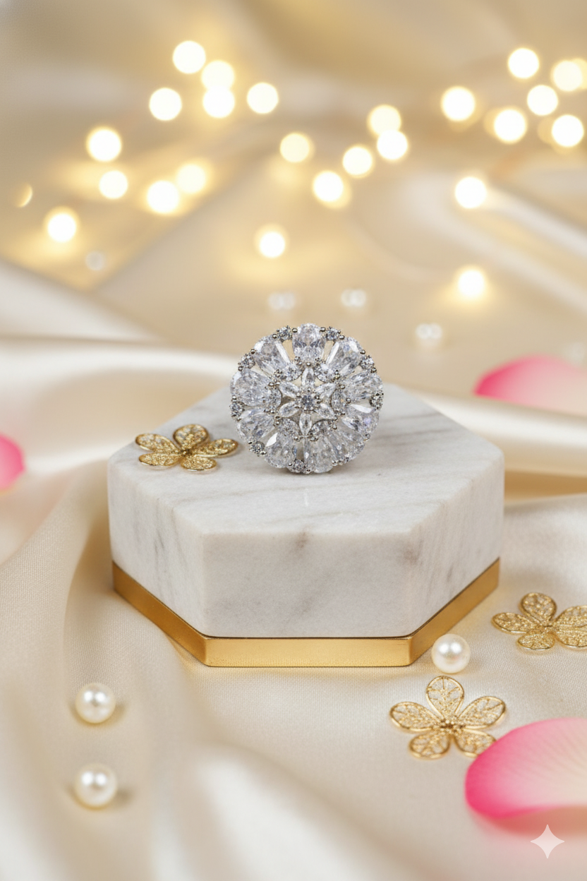 Diamond ring on a marble stand with decorative elements on a soft background