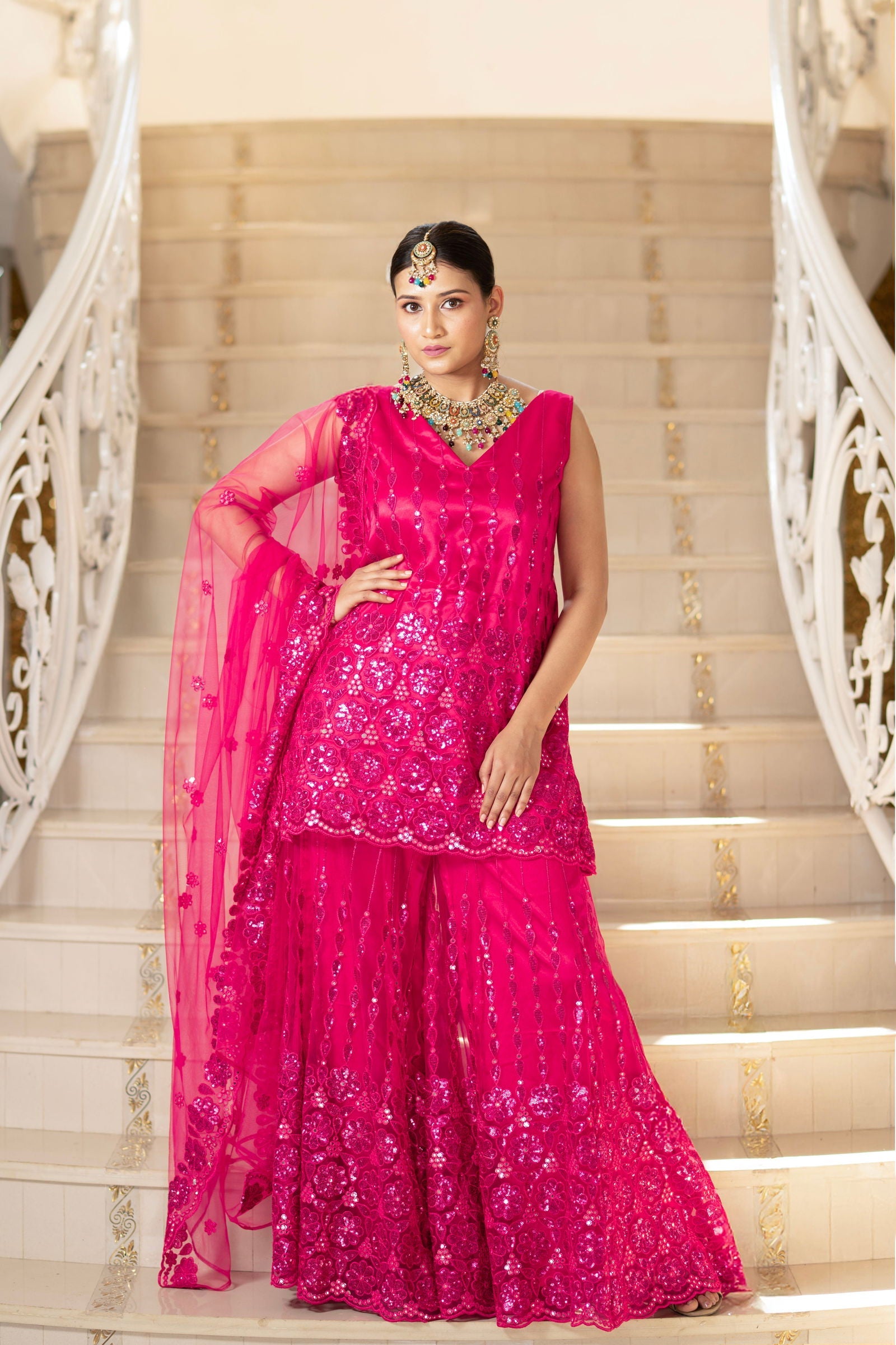 Fuchsia Pink Super Net Sleeveless Kurta with Flared Palazzo Set - Mayrake.in