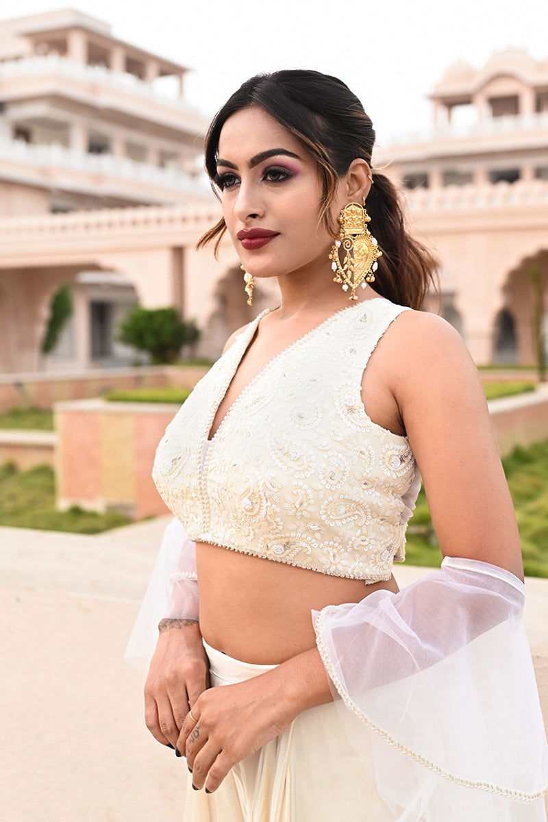 Gold Metal Paan-Shaped Teardrop Pearls Ghungroo Accents Earrings - Mayrake.in