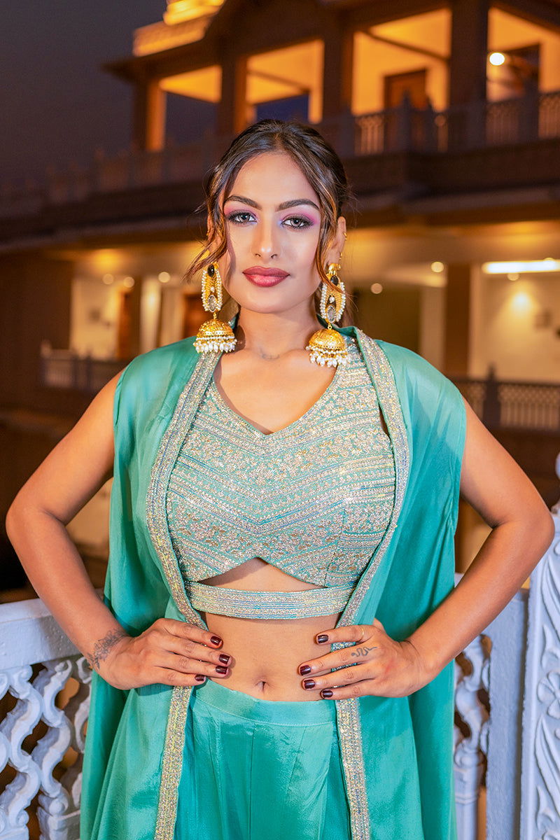 Golden Jhumka Earrings with Pearls and Black Stone - Mayrake -