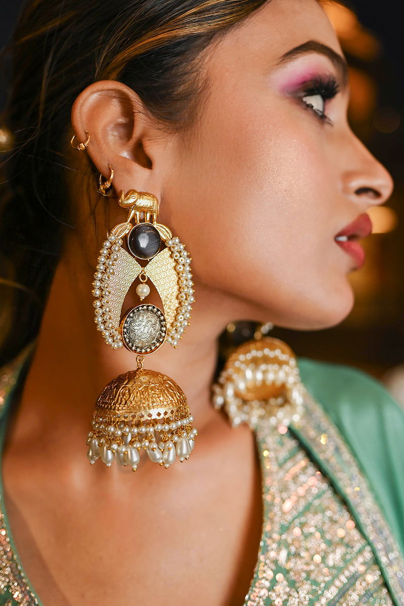 Golden Jhumka Earrings with Pearls and Black Stone - Mayrake -