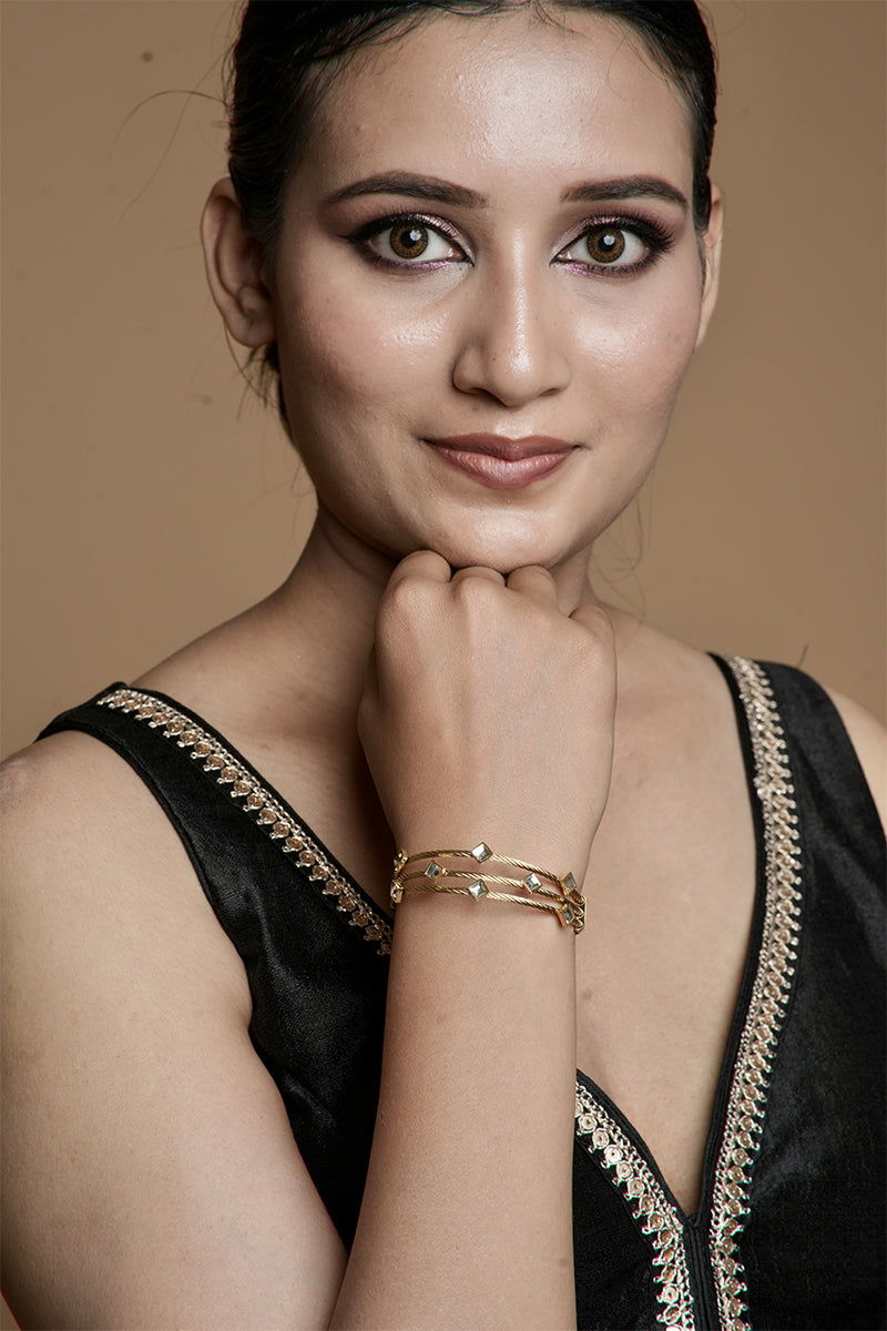 Golden layered metal bracelets with a stone link lock - Mayrake