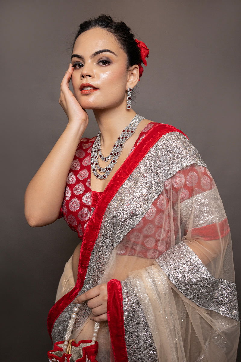 Ivory Golden Net Saree with Sequin Paired with a Brocade Stitched Designer Blouse - Mayrake