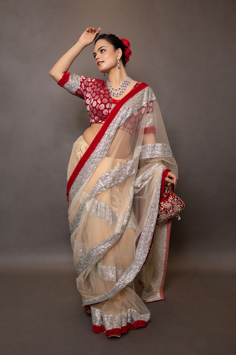 Ivory Golden Net Saree with Sequin Paired with a Brocade Stitched Designer Blouse - Mayrake