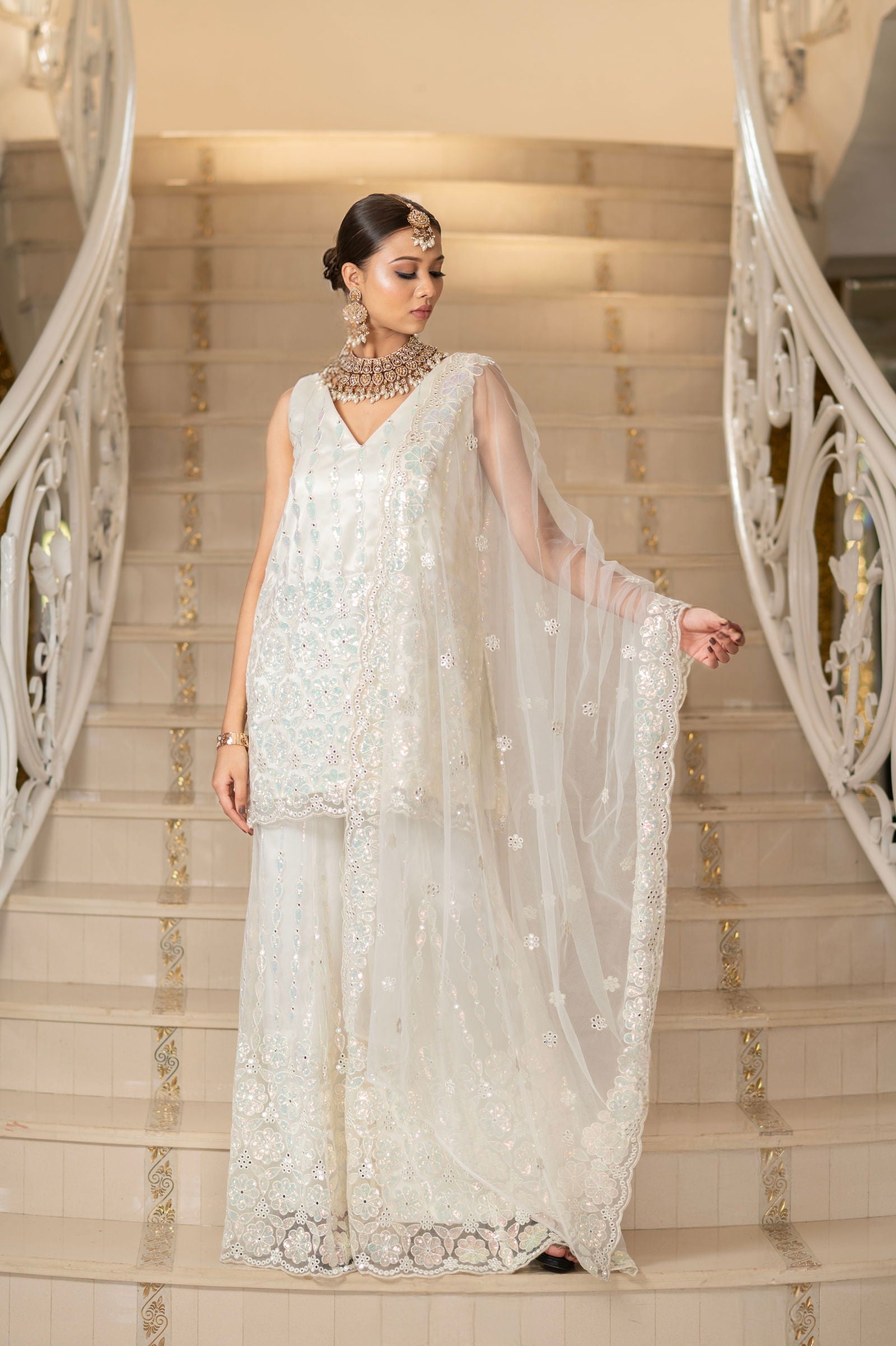 Ivory Pearl White Super Net Sleeveless Kurta With Flared Palazzo Set - Mayrake.in