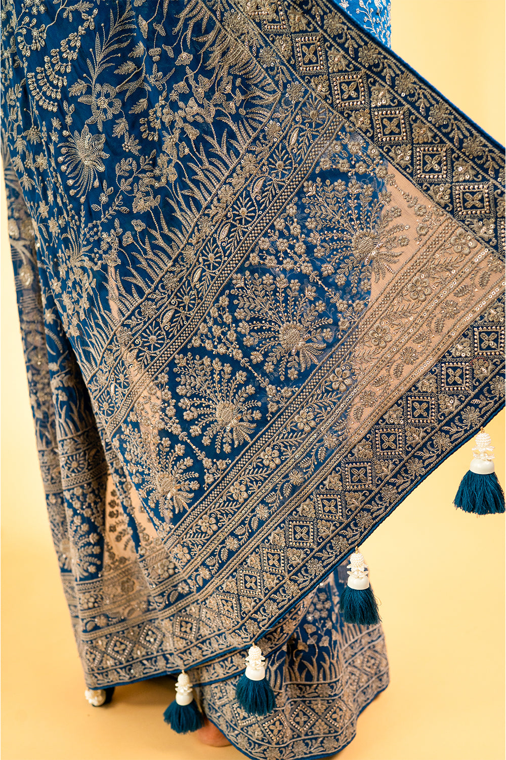 Light Yellow Lucknowi Georgette Saree with Beautiful Tassels and Zari Work