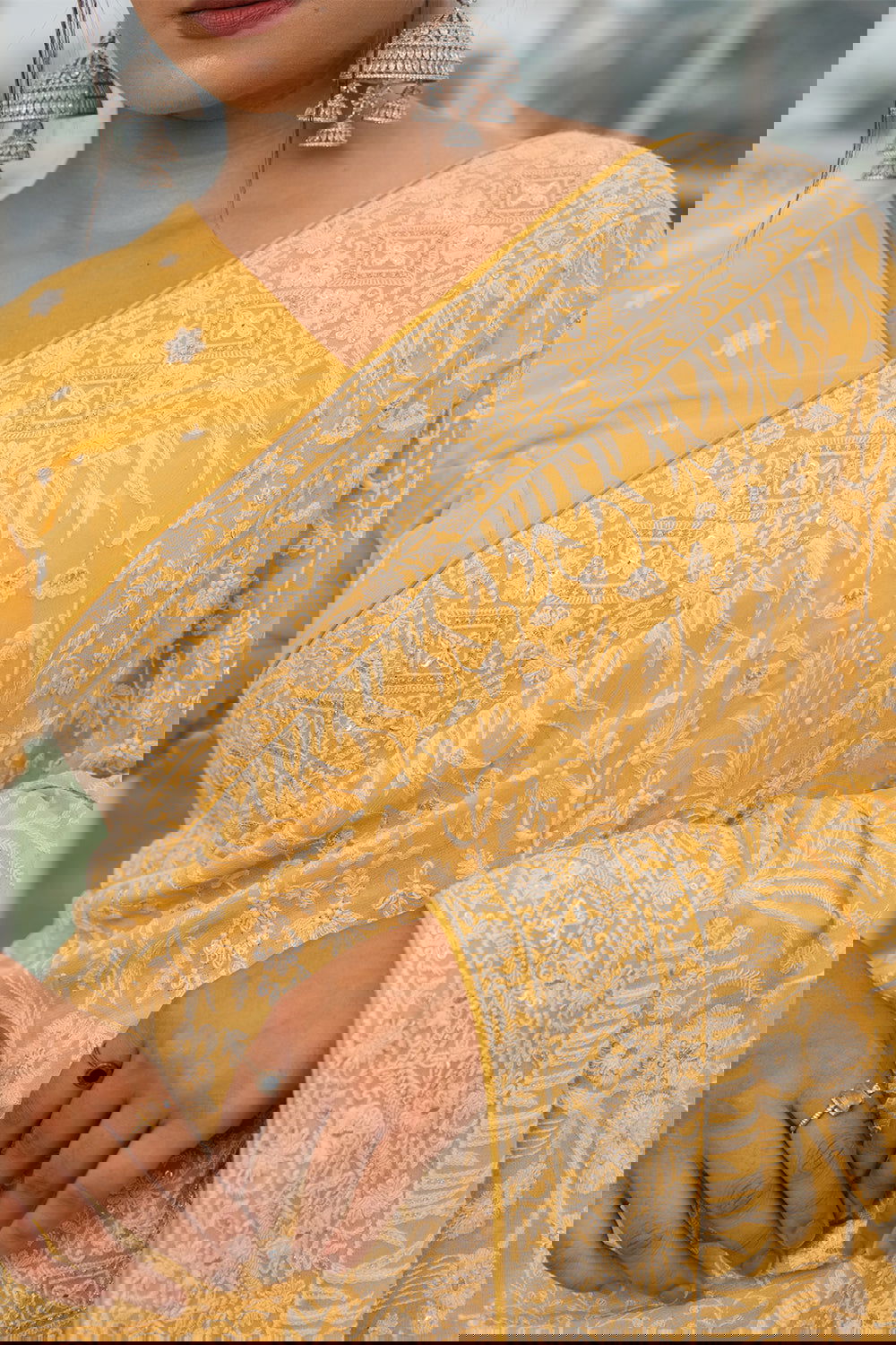 Light Yellow Lucknowi Georgette Saree with Beautiful Tassels and Zari Work - Mayrake.in