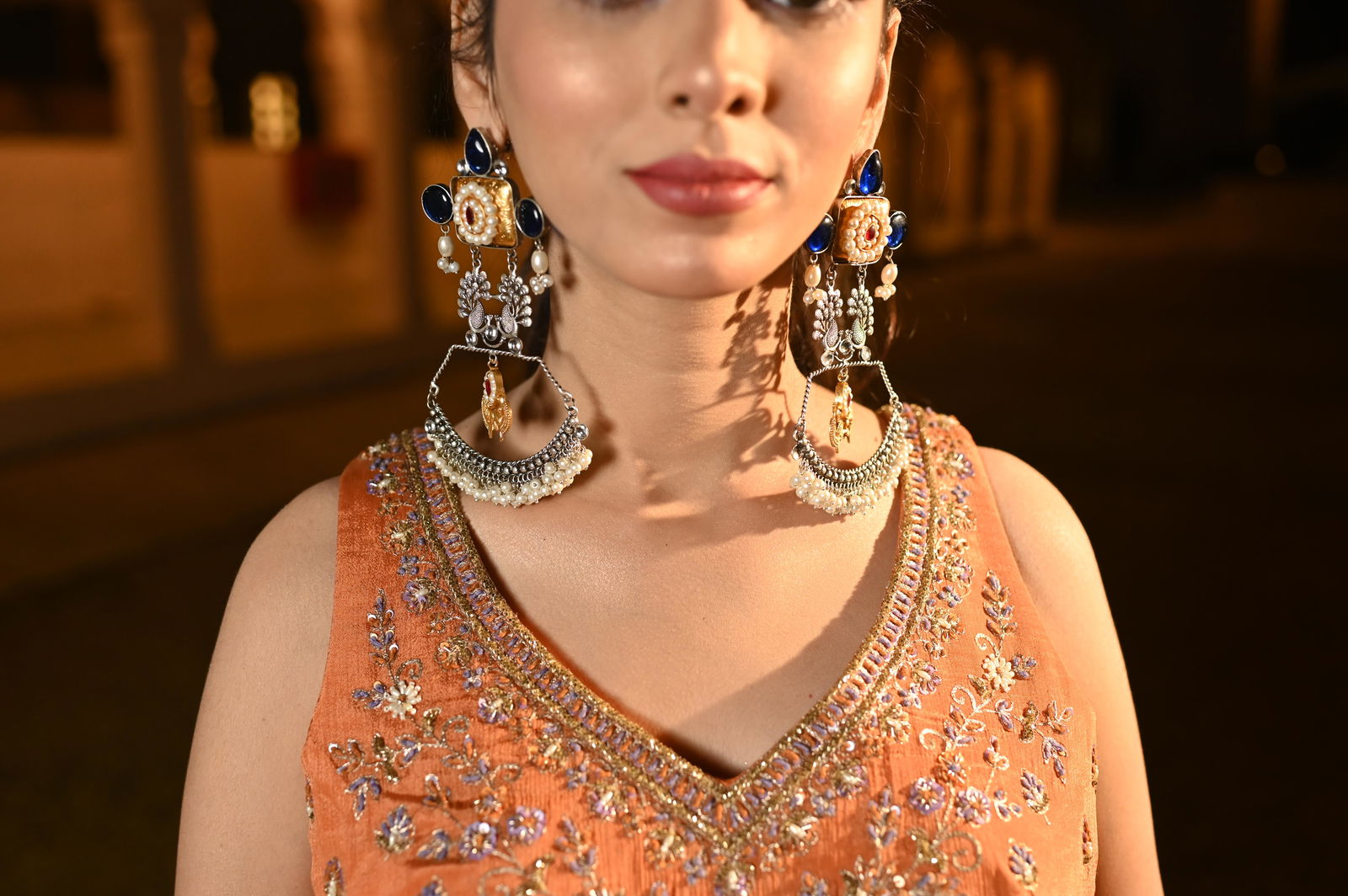 Long Kundan Earrings with Blue Stones, Pearls, and Peacock Design - Mayrake -
