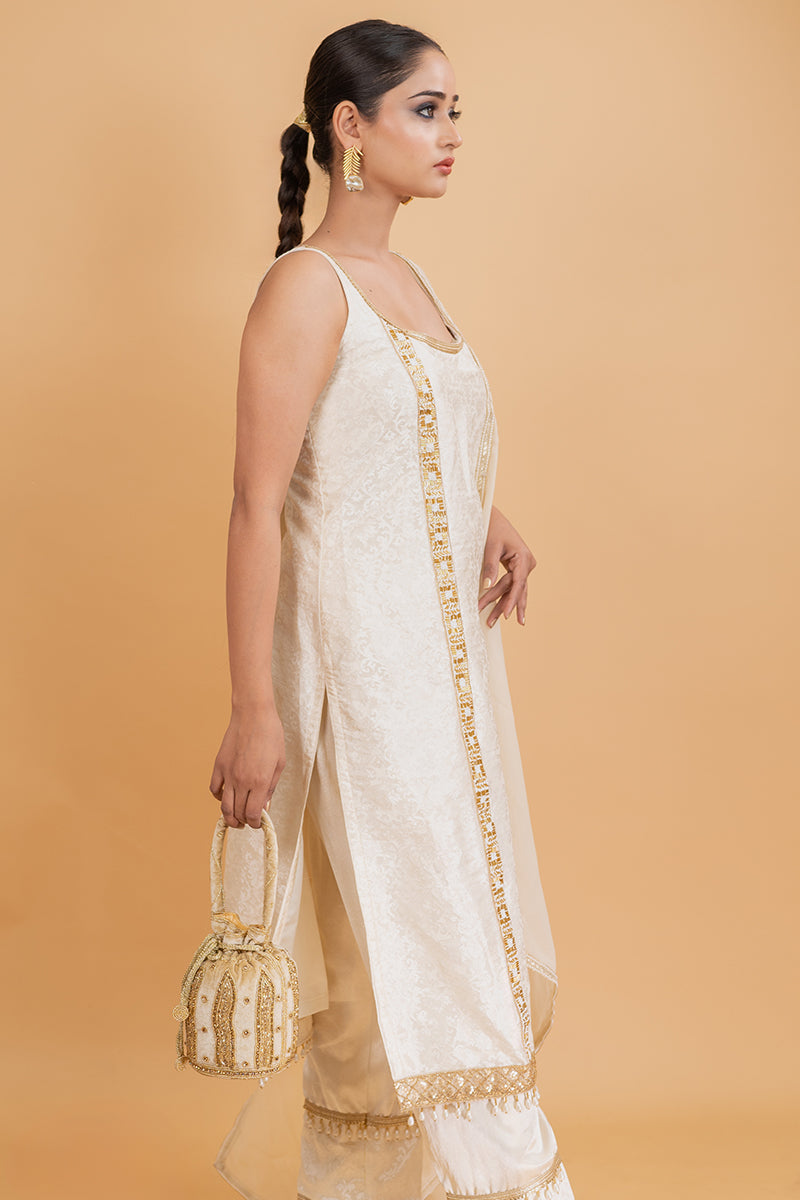 Beige Color Hanging Potli with Golden Beads and Zari Designs with Velvet Base