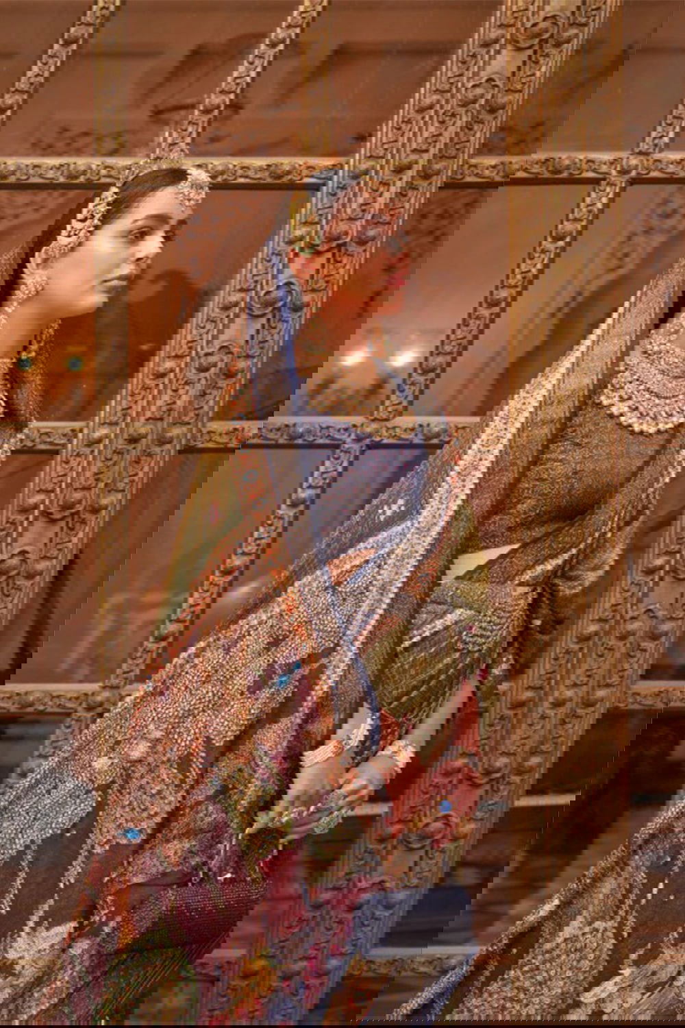 Mehndi Green Raw Silk Saree with Floral Motifs - Mayrake.in