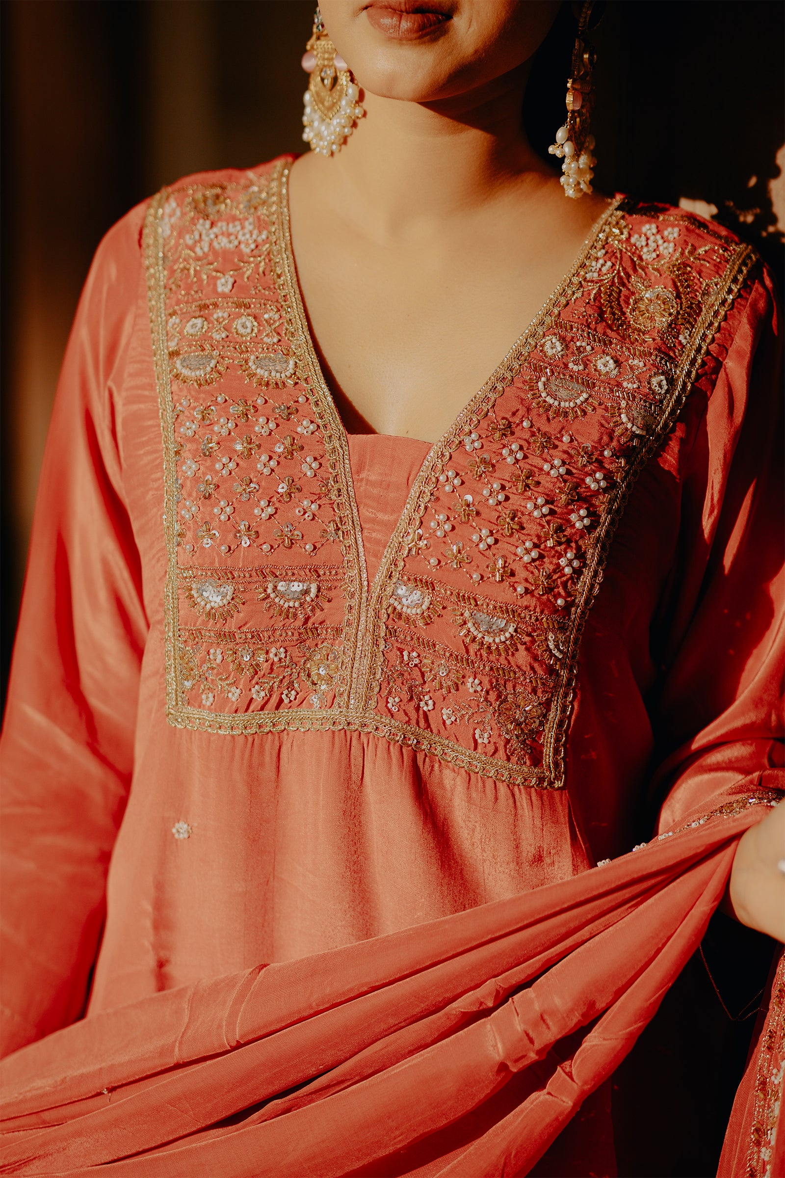 Orange_Crepe_Silk_Suit_with_Farsi_Salwar_Dupatta_0000_03_MODEL