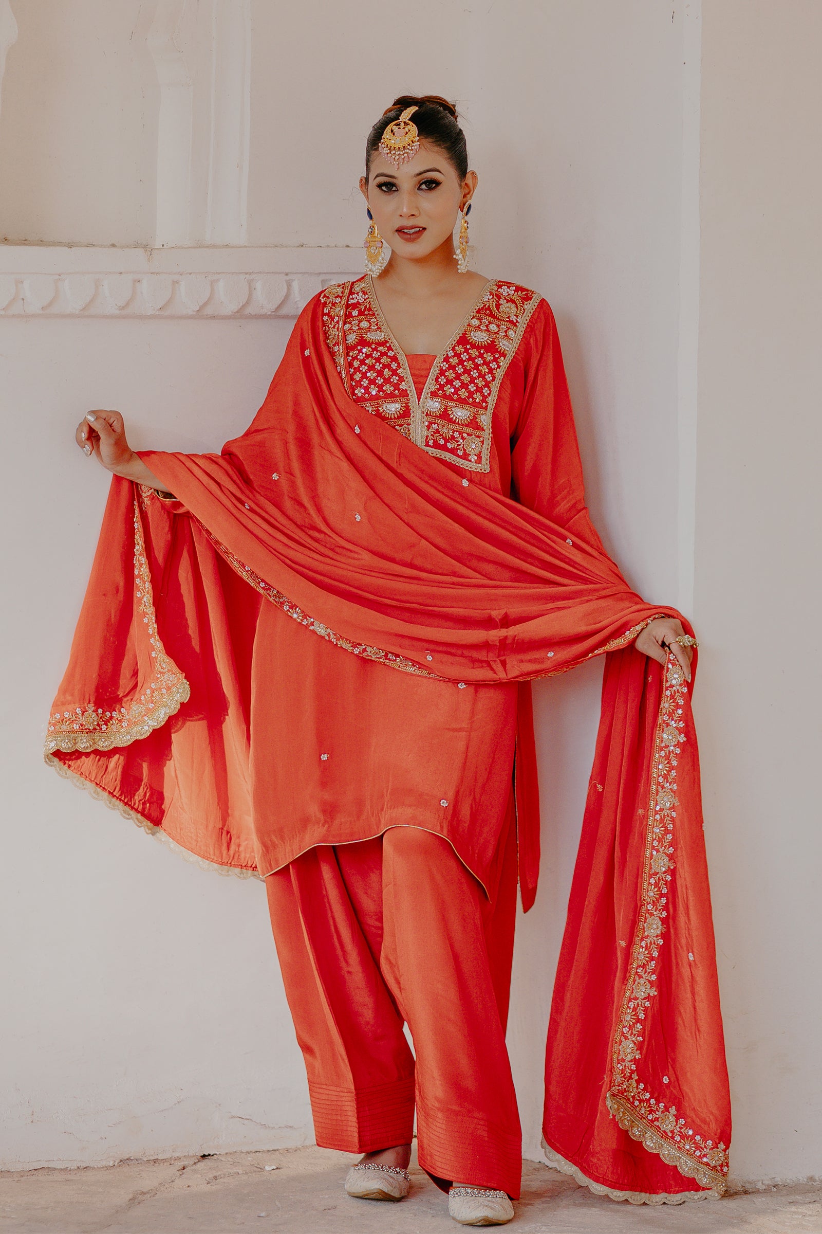 Orange_Crepe_Silk_Suit_with_Farsi_Salwar_Dupatta_0002_24_MODEL