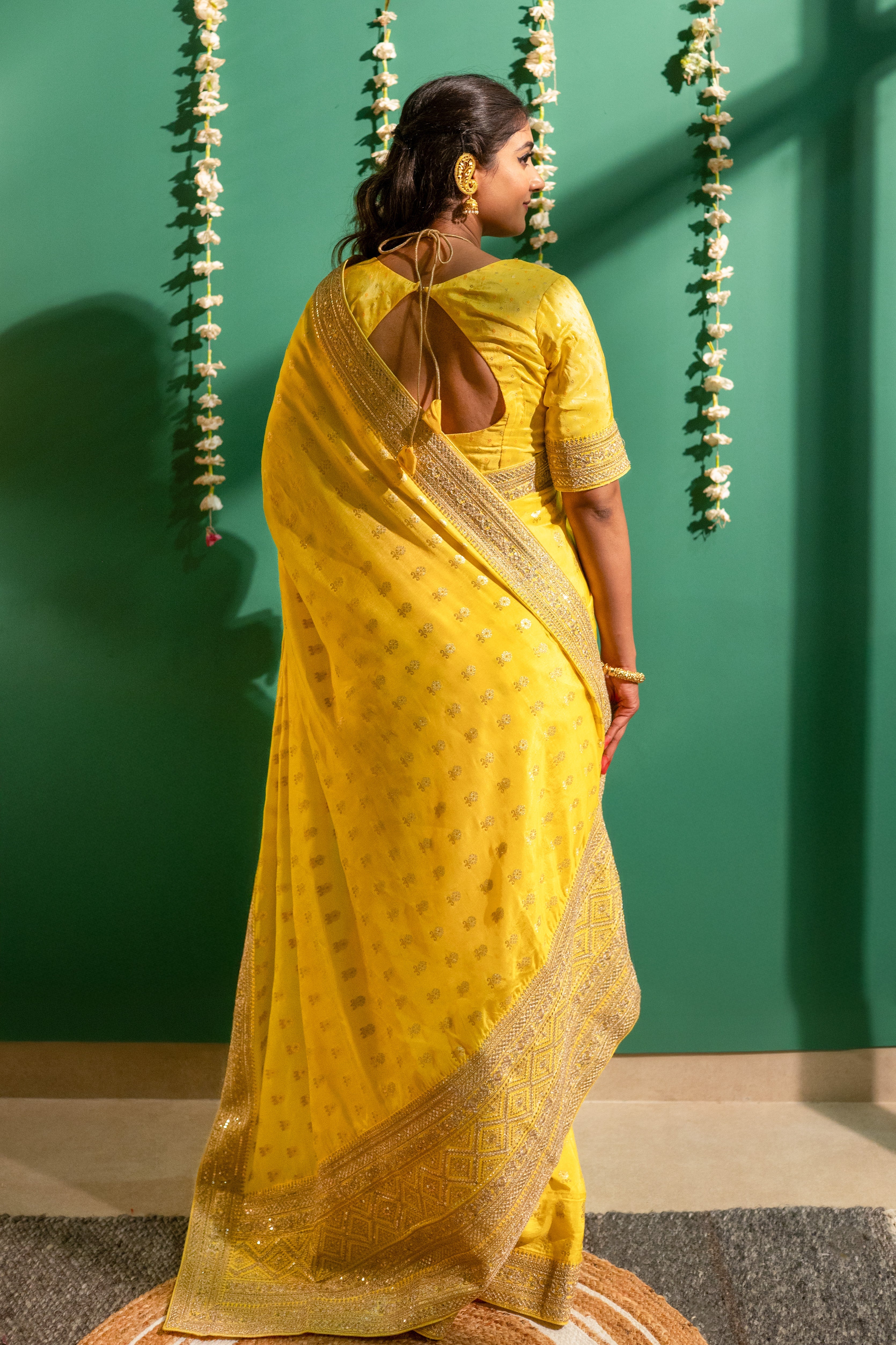 Yellow Silk Saree with Golden Buti Work and Rich Zari Border