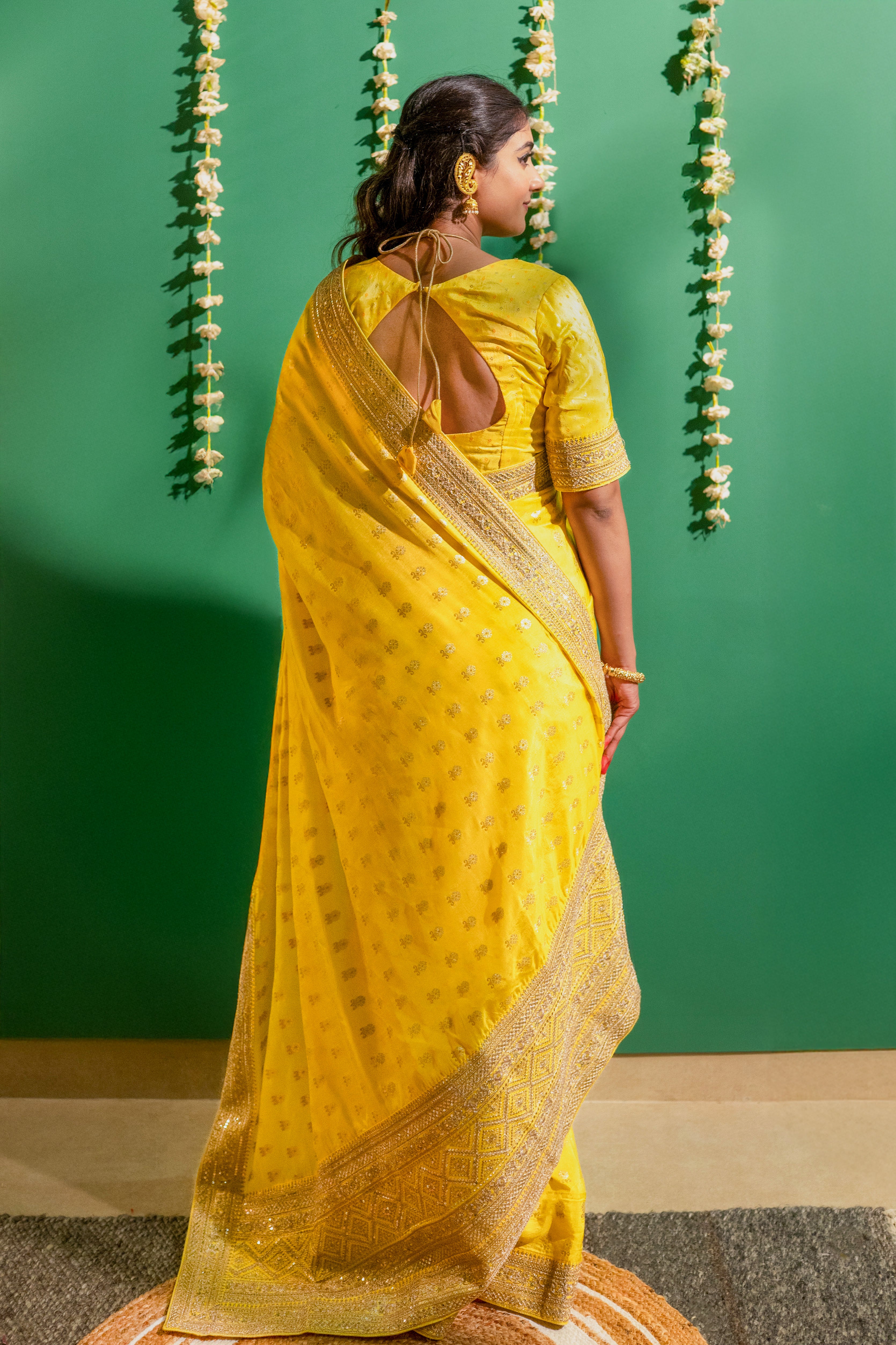 Yellow Silk Saree with Golden Buti Work and Rich Zari Border