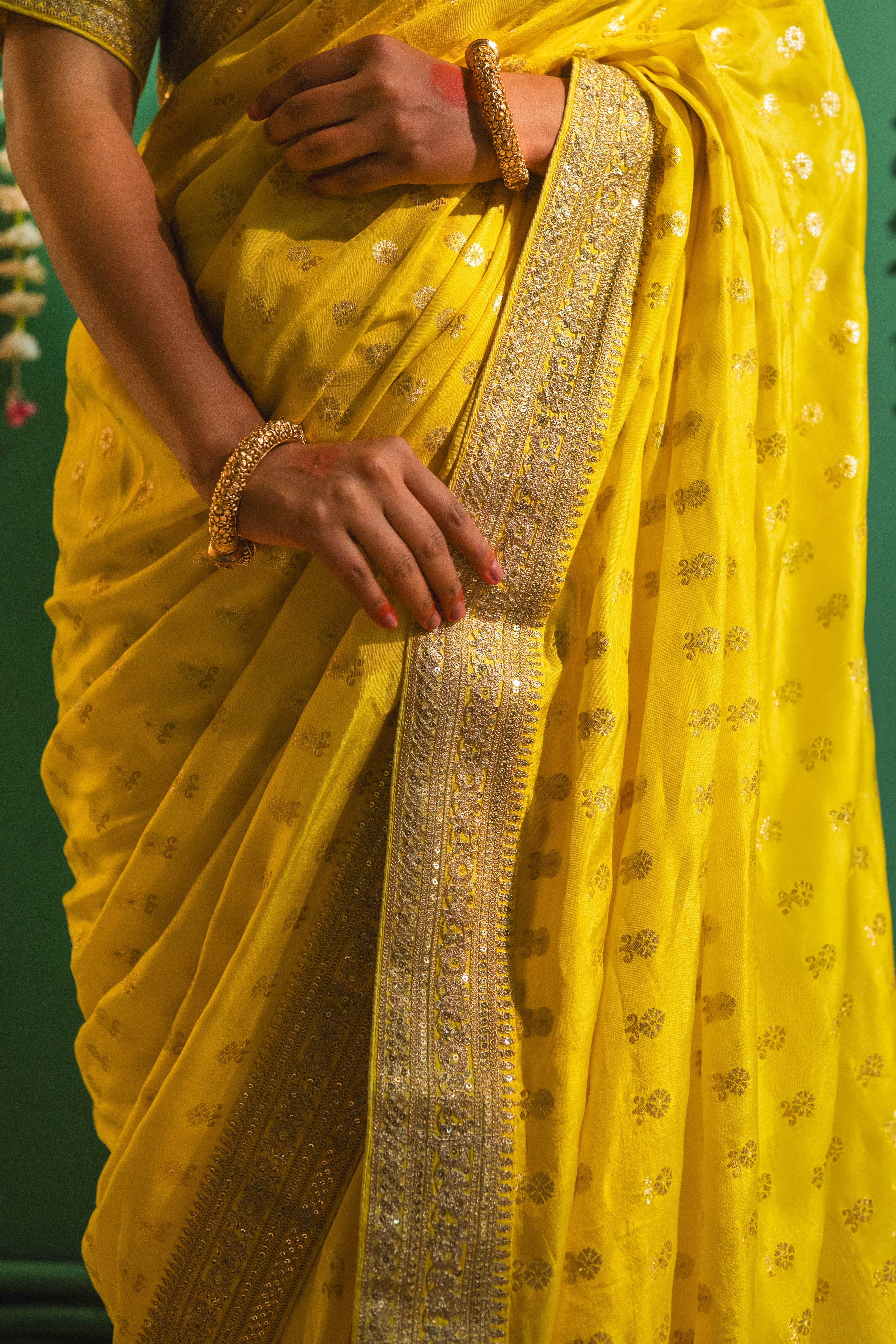 Yellow Silk Saree with Golden Buti Work and Rich Zari Border