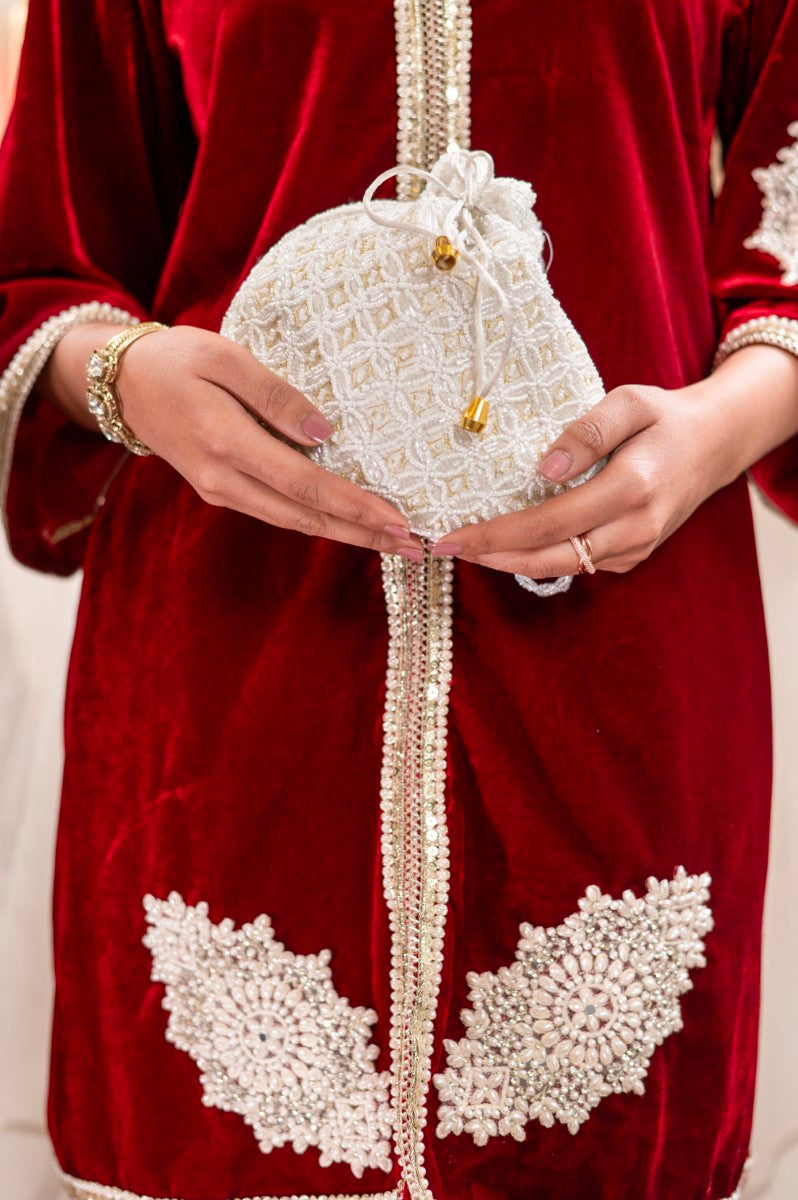 Milky White Potli with Pearl and Golden Thread Work