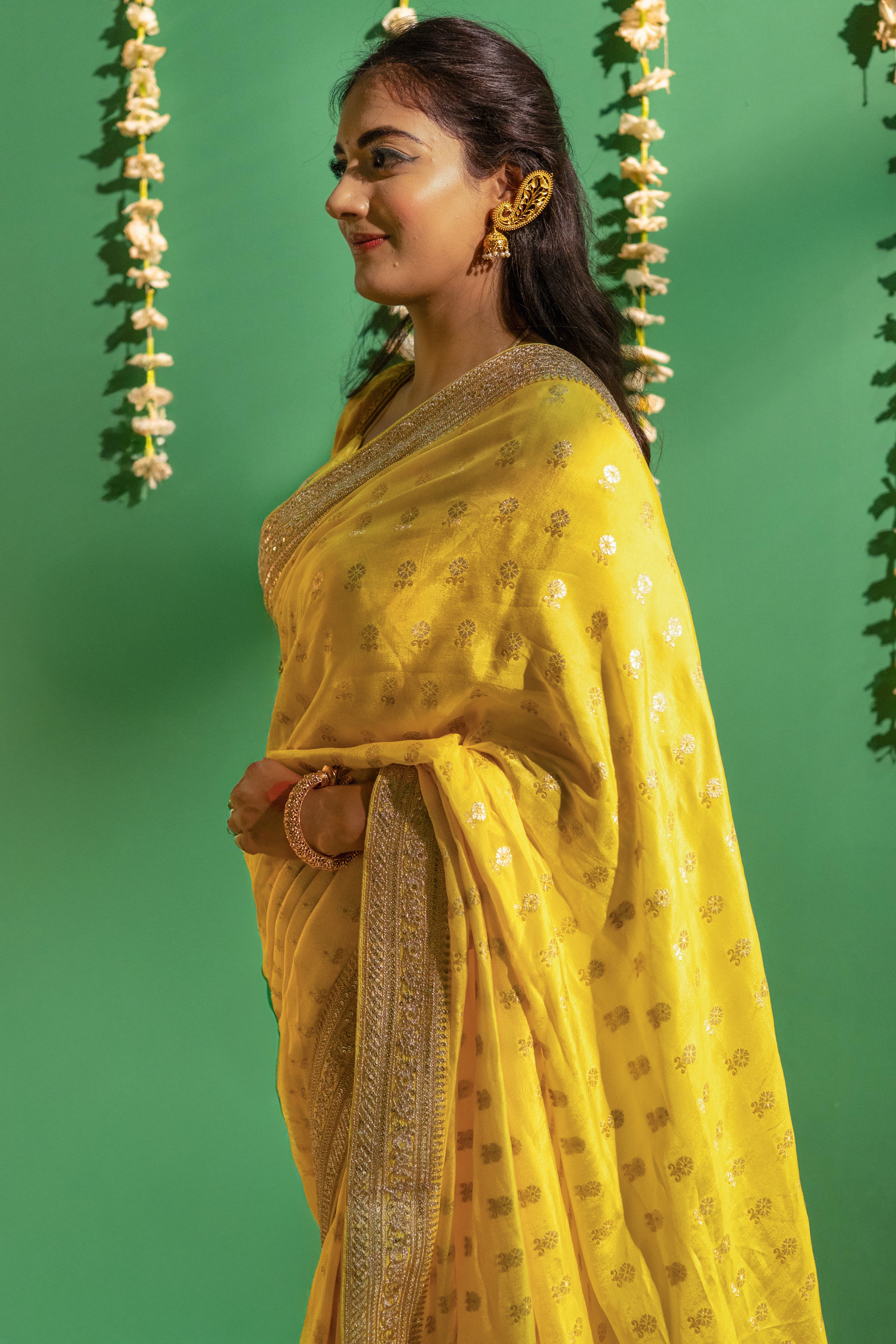 Yellow Silk Saree with Golden Buti Work and Rich Zari Border