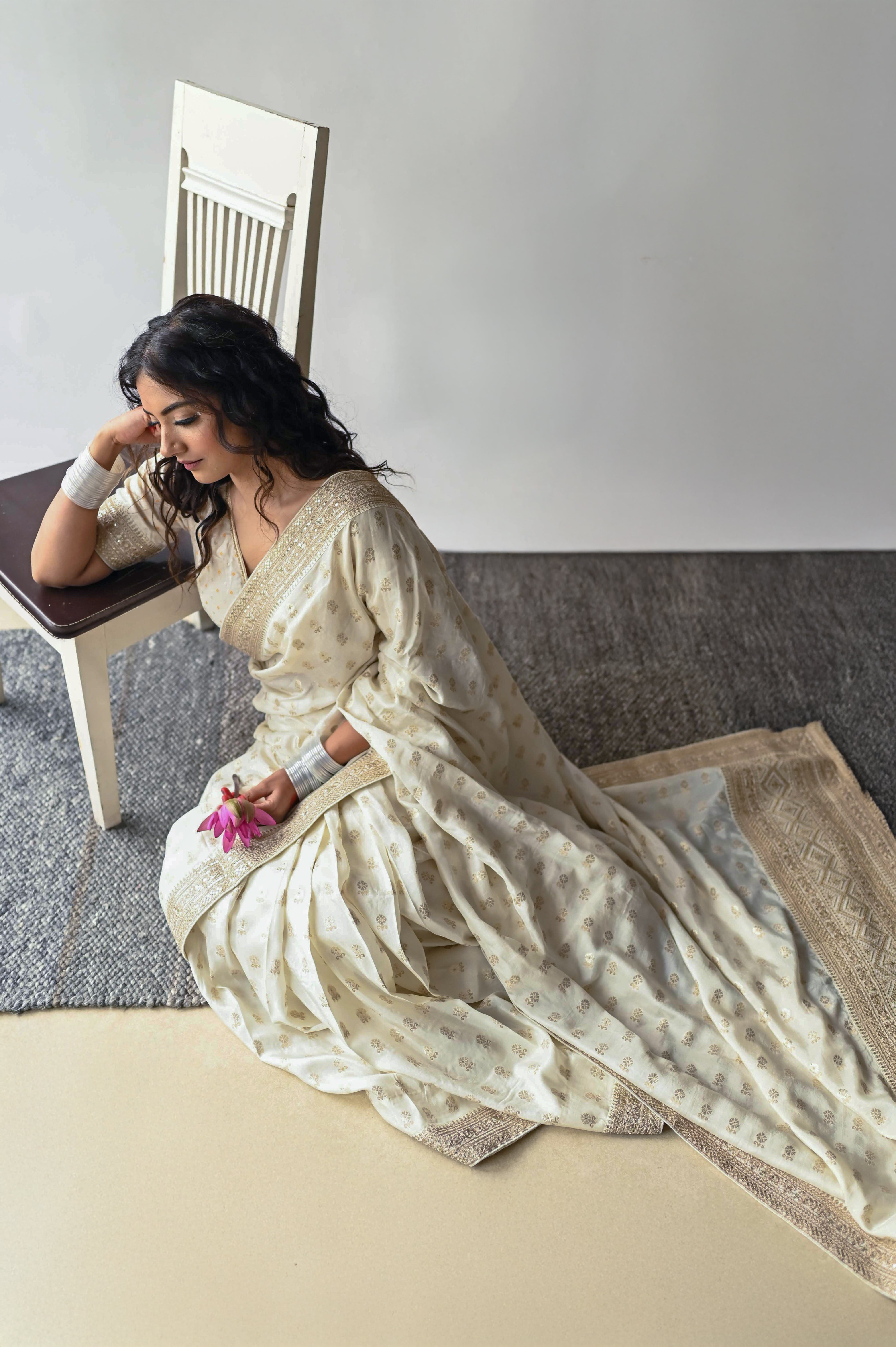 Cream Silk Saree with Golden Buti Work and Rich Zari Border