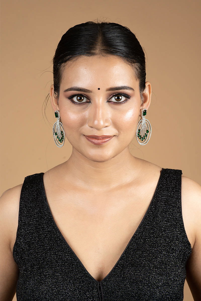 Sparkling AD Chandbali Earrings Adorned with Green Stones - Mayrake