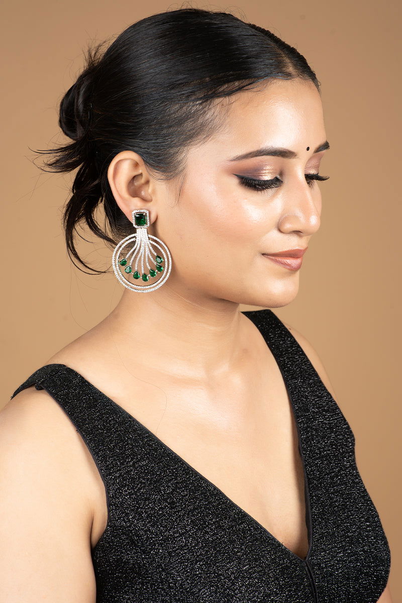 Sparkling AD Chandbali Earrings Adorned with Green Stones - Mayrake