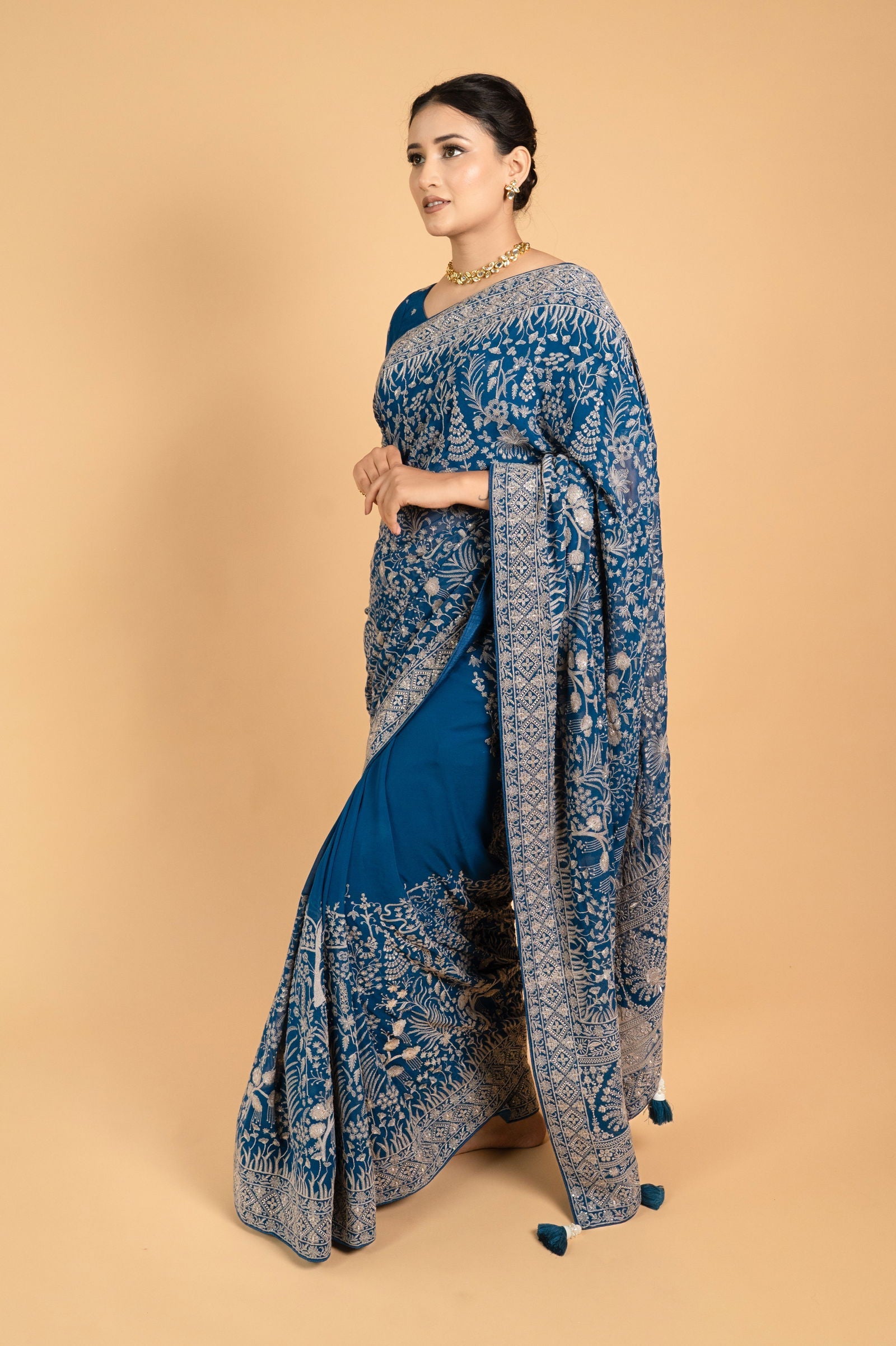 Teal Blue Lucknowi Georgette Saree with Beautiful Tassels and Zari Work - Mayrake.in