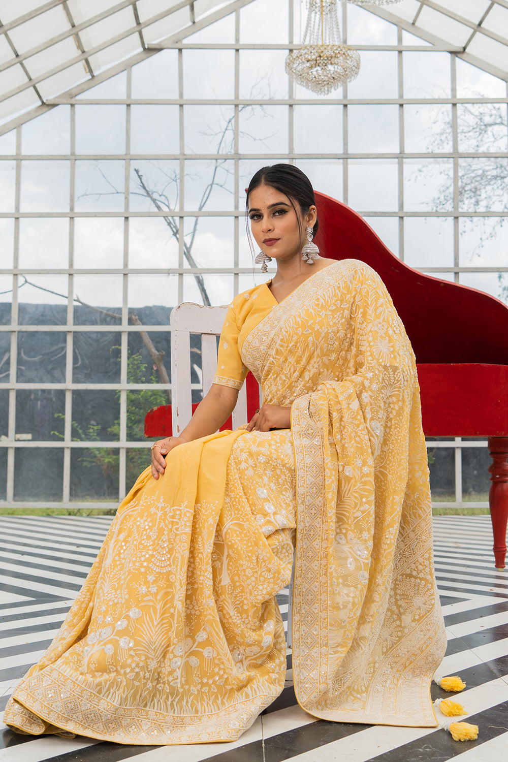 Light Yellow Lucknowi Georgette Saree with Beautiful Tassels and Zari Work