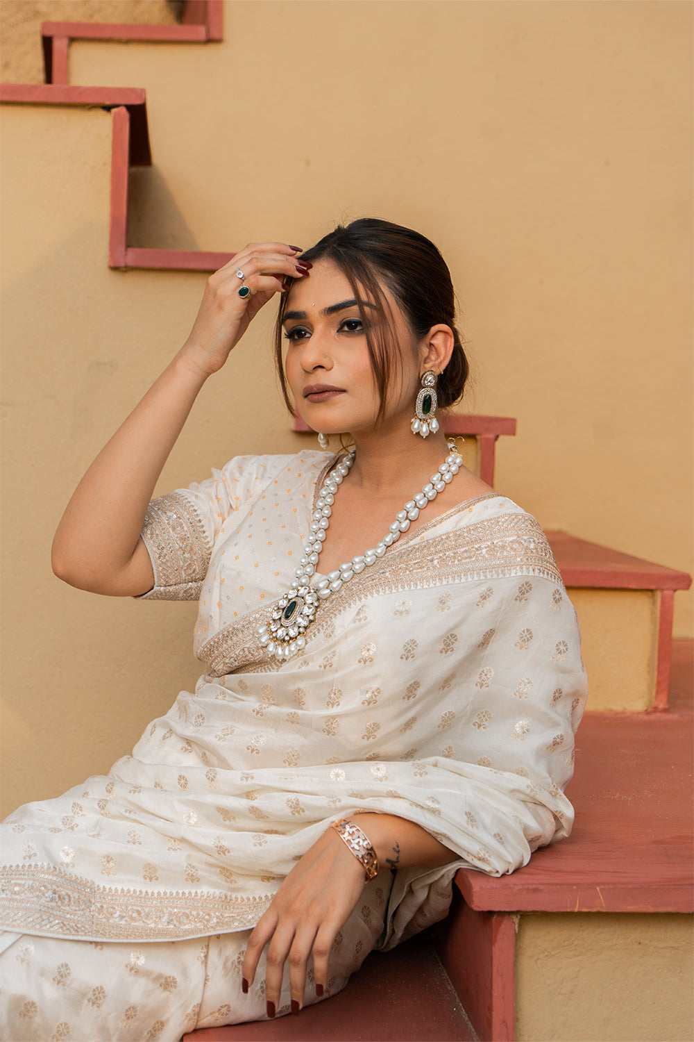 Cream Silk Saree with Golden Buti Work and Rich Zari Border