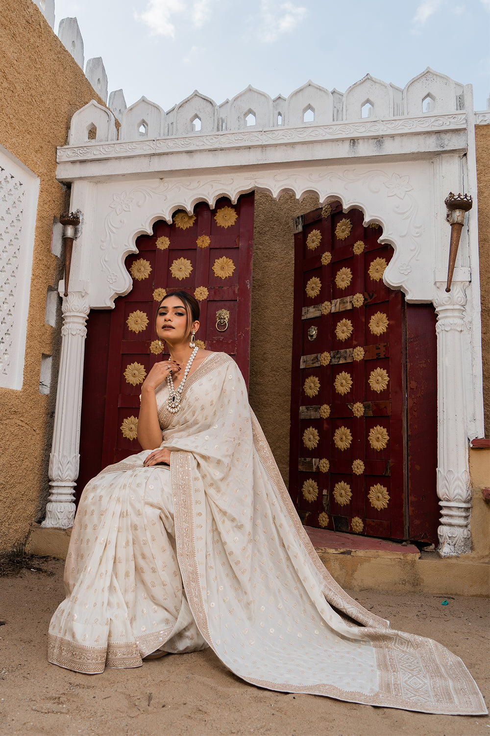 Cream Silk Saree with Golden Buti Work and Rich Zari Border