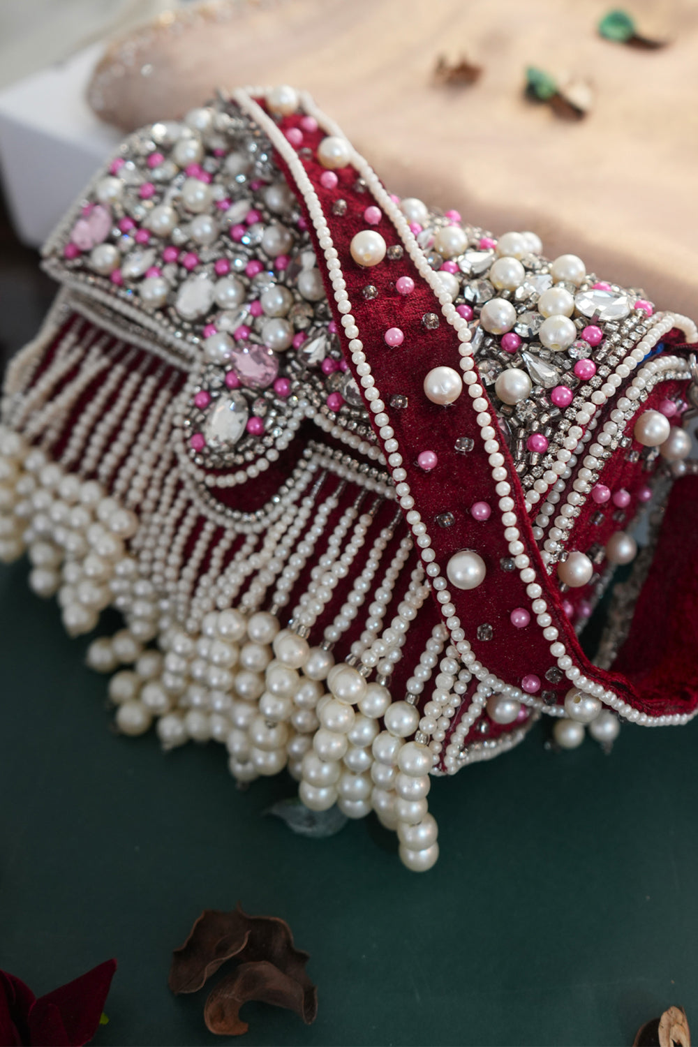 Zari Adorned Maroon Handbag with Pink Beads, Pearls, and Tassel
