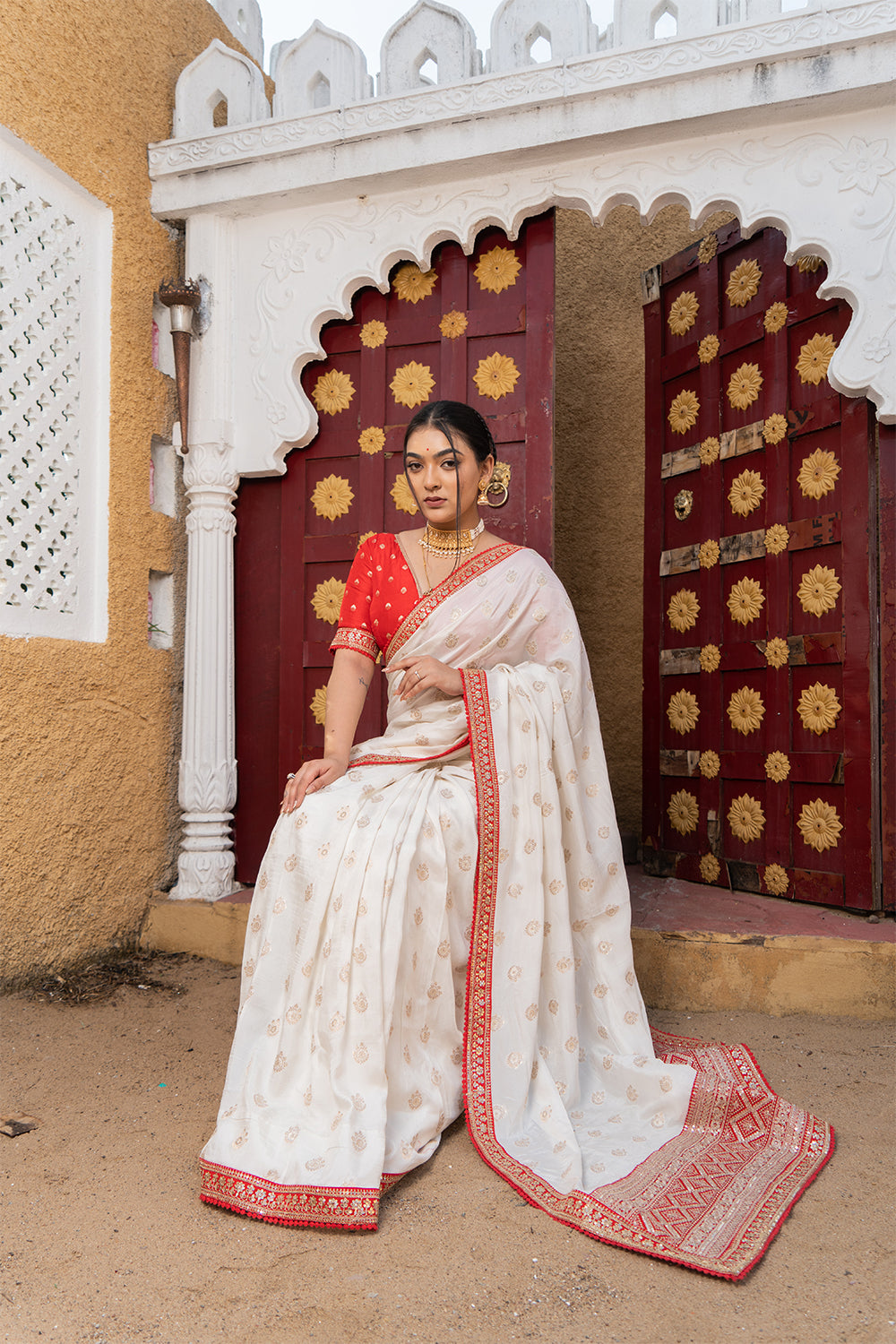 Cream Silk Saree with Golden Buti Work and Rich Red Zari Border