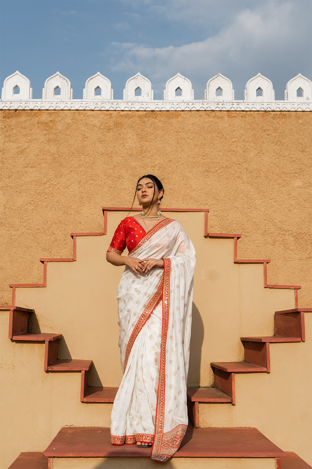 Cream Silk Saree with Golden Buti Work and Rich Red Zari Border