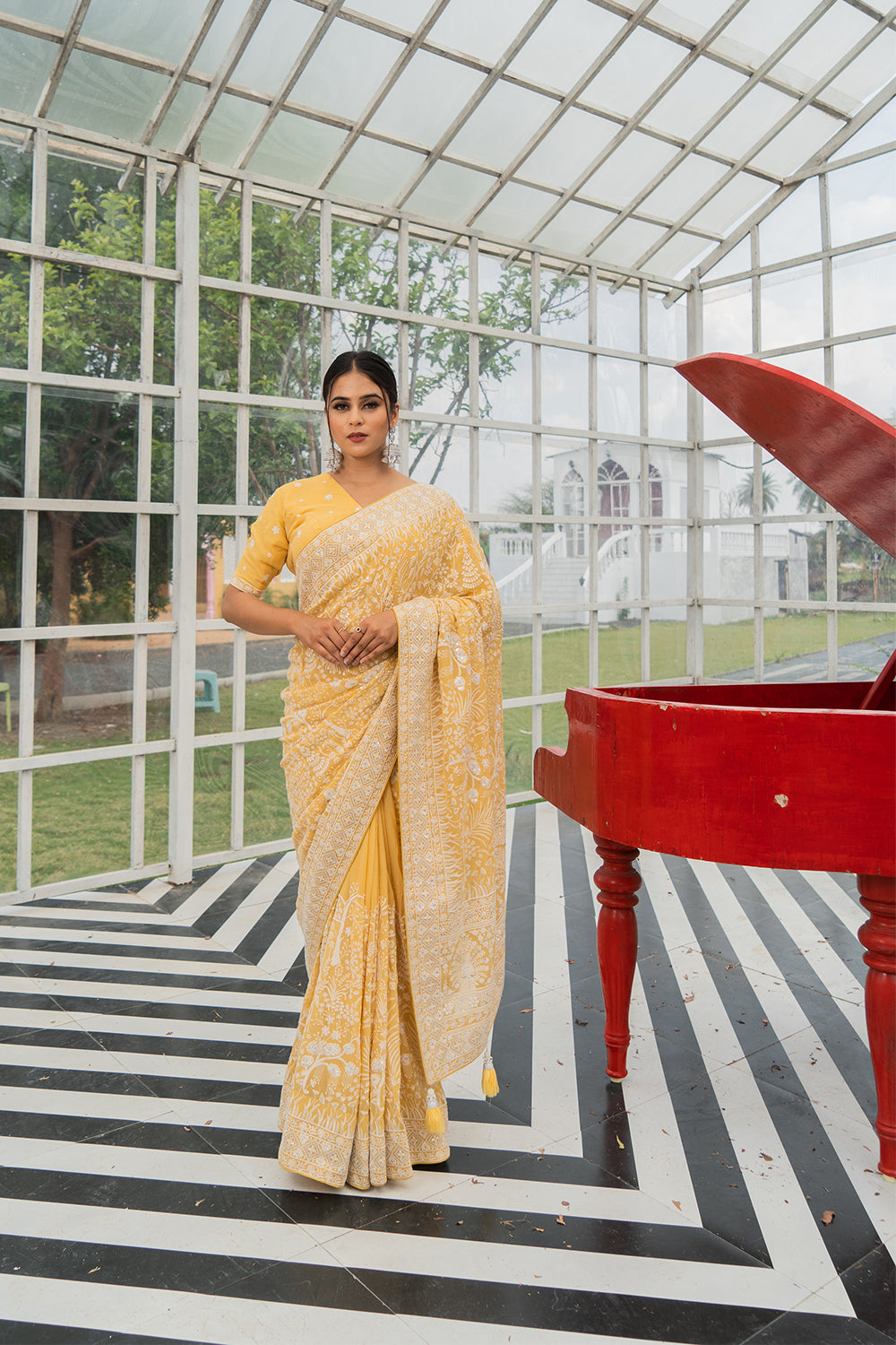 Light Yellow Lucknowi Georgette Saree with Beautiful Tassels and Zari Work