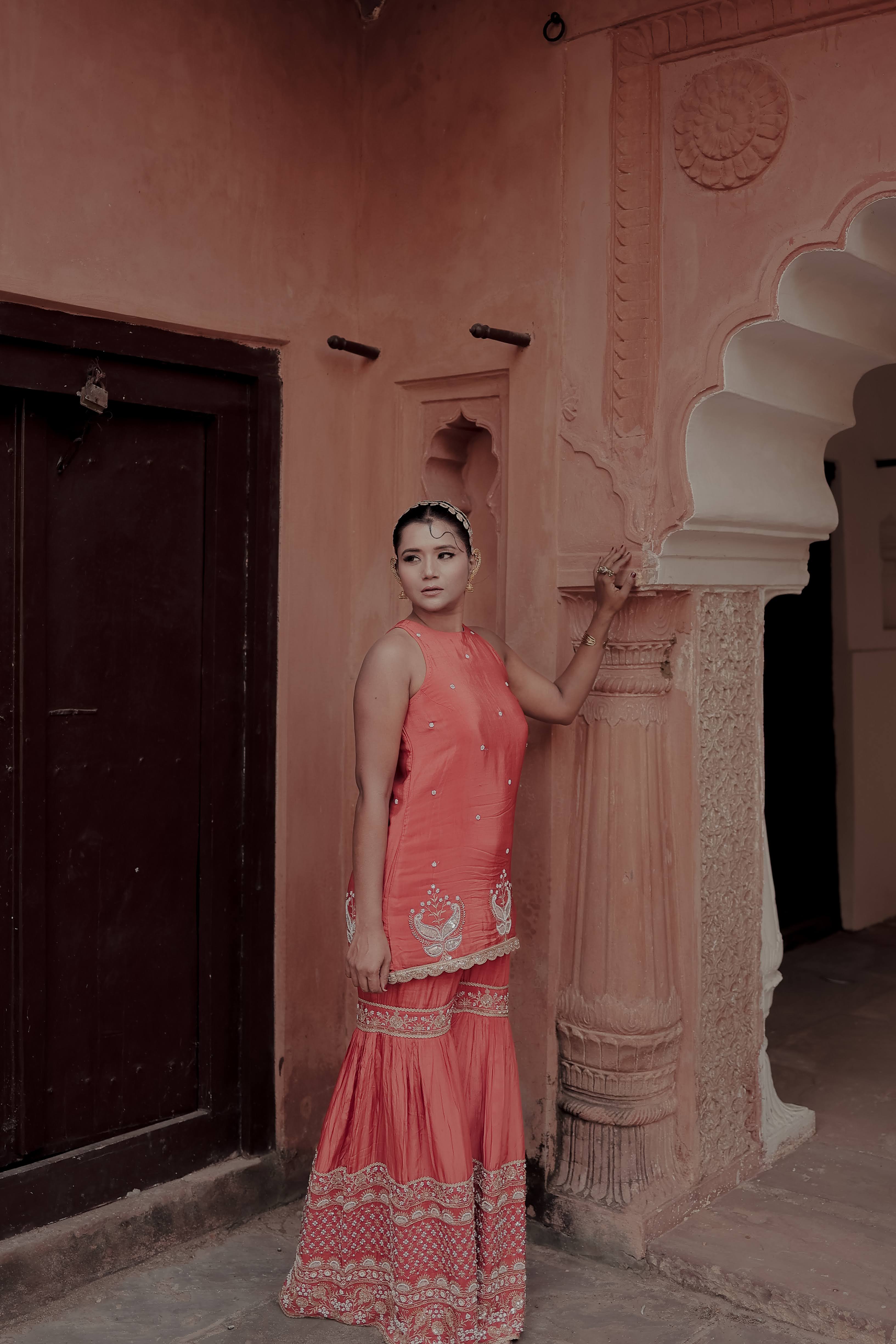 Orange Crepe Silk Sleeveless Suit with Gharara & Dupatta