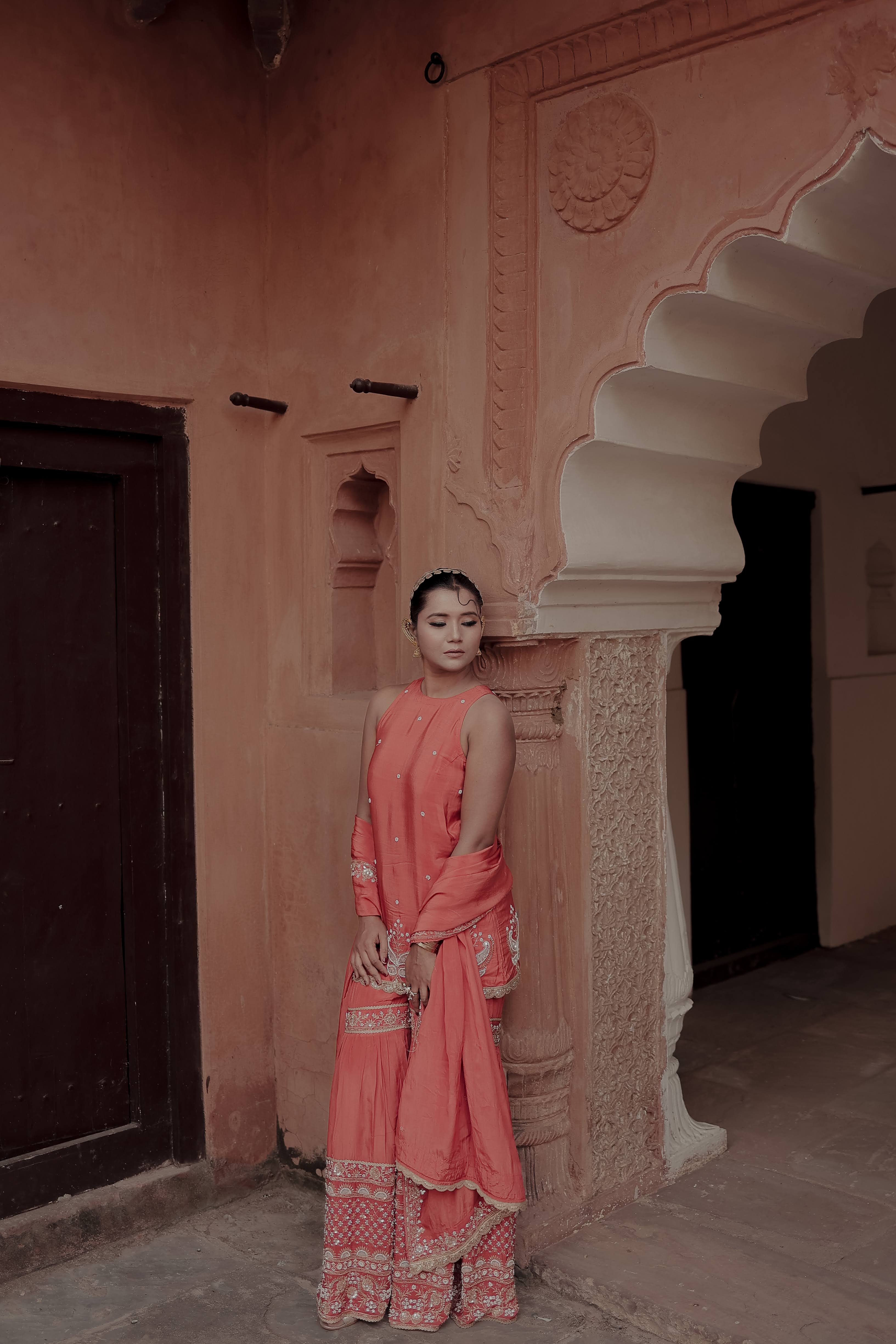 Orange Crepe Silk Sleeveless Suit with Gharara & Dupatta