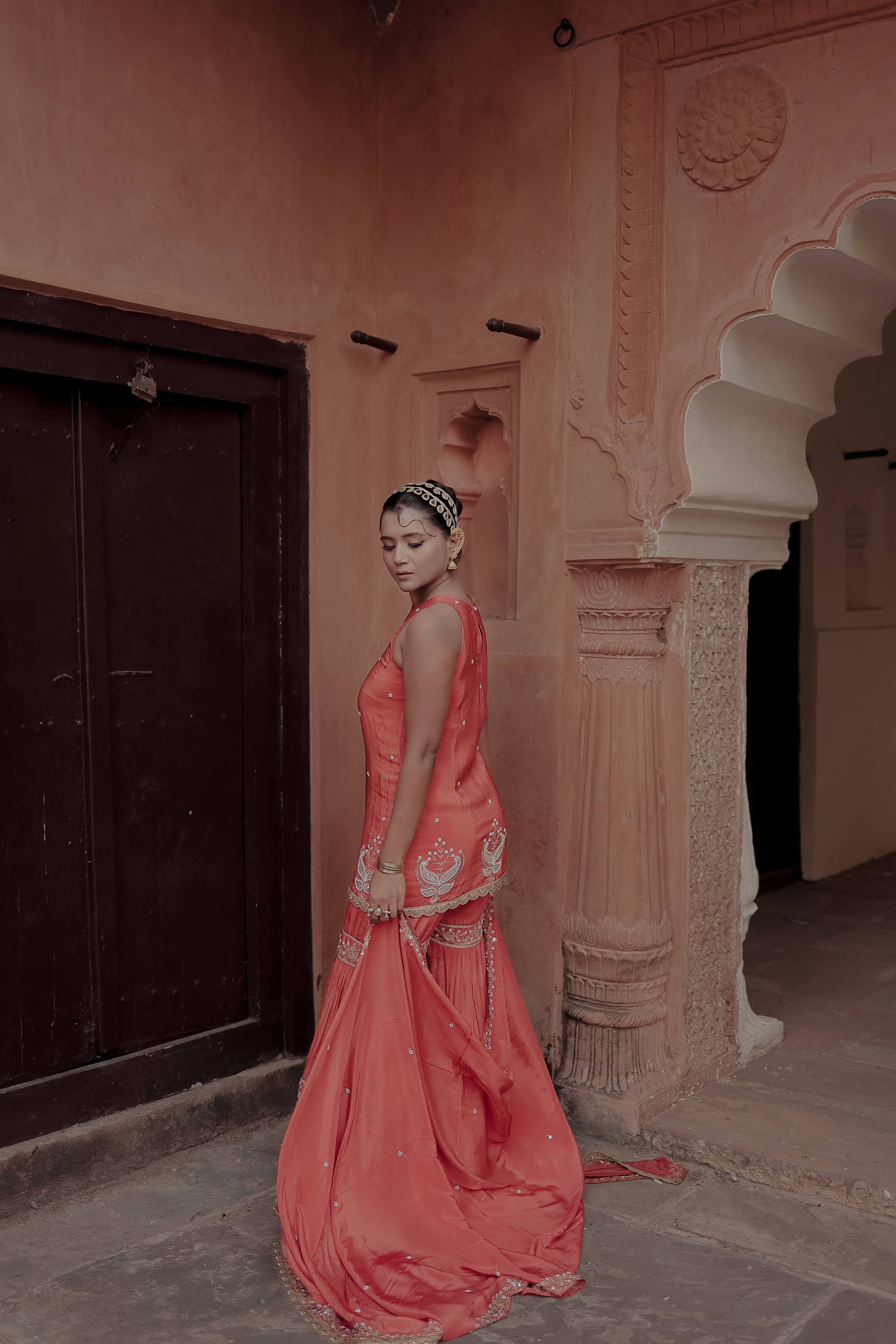 Orange Crepe Silk Sleeveless Suit with Gharara & Dupatta