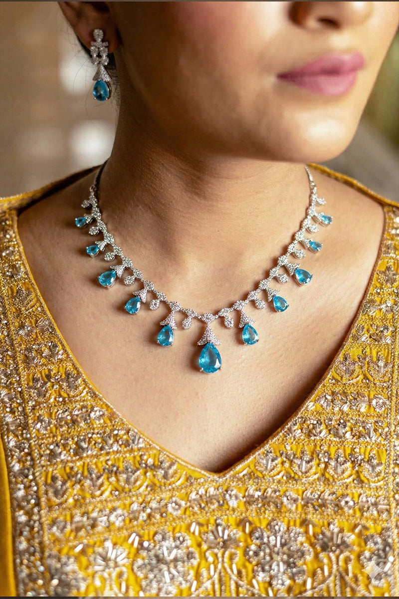 Sky Blue Teardrop Stone Necklace Set with Floral Diamond-Studded Detailing