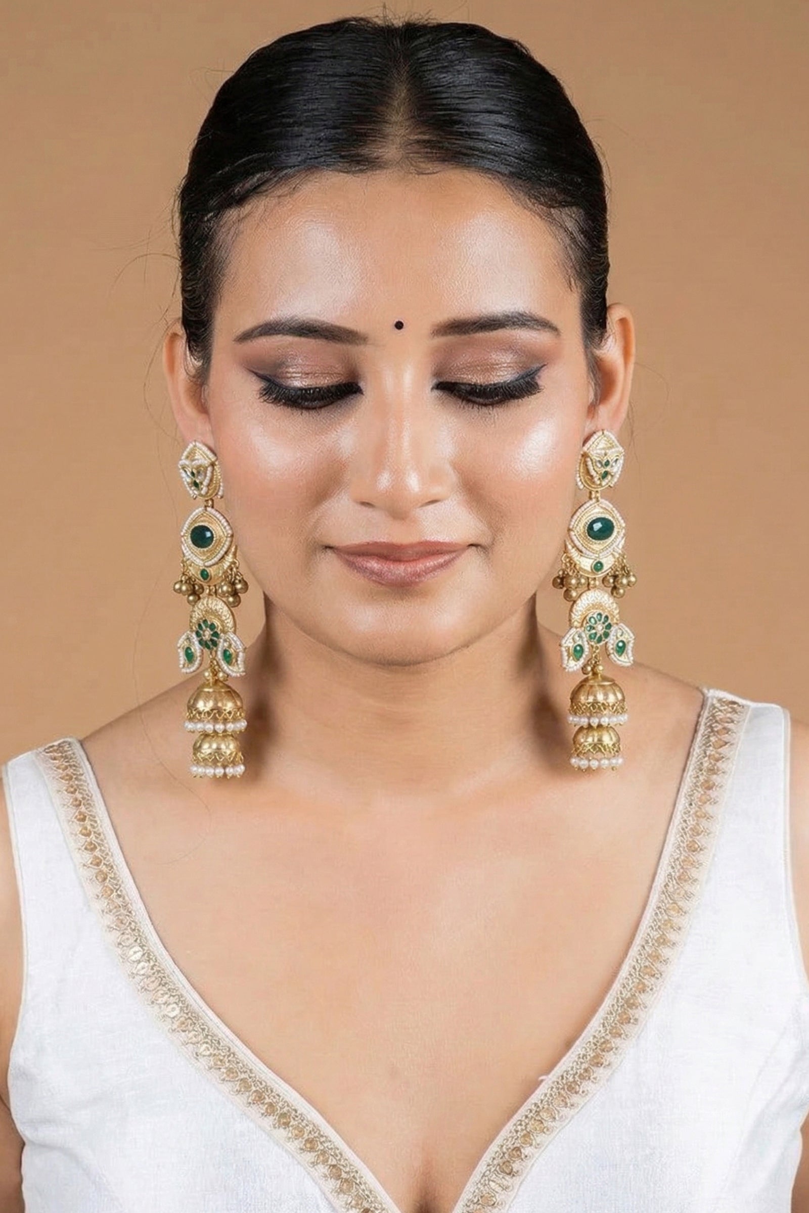 Royal Green Stone Golden Jhumka Earrings with Kanoti Chain