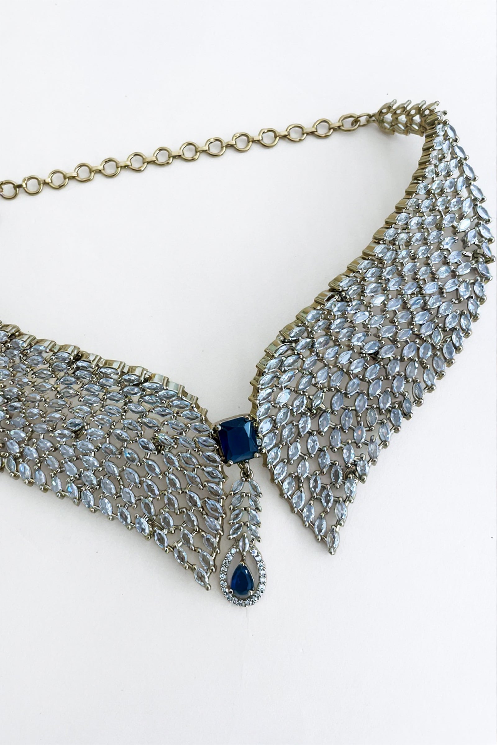 Gold Curved Diamond Collar Necklace with Midnight Blue Center Stone & Matching Stud Earrings