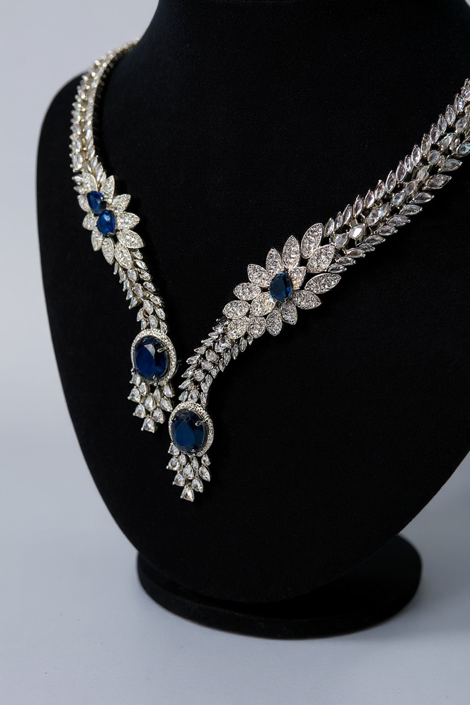 Blue & Silver-Tone Oval shaped American Diamond Necklace Set with Floral Motif