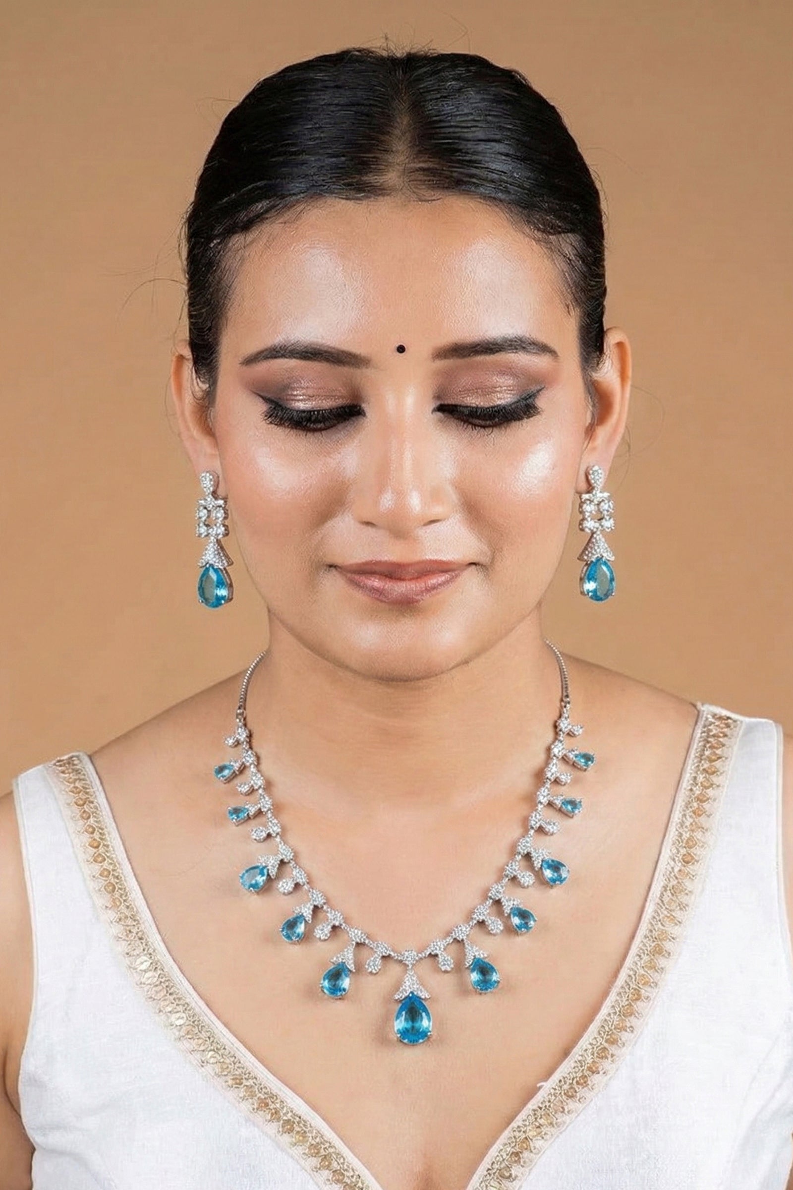 Sky Blue Teardrop Stone Necklace Set with Floral Diamond-Studded Detailing