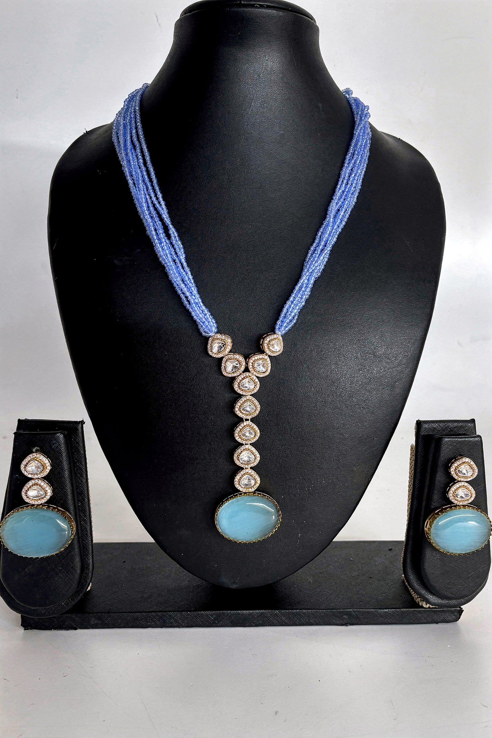 Sky Blue Multi-Strand Beaded Necklace with Antique Gold Oval Pendant & Matching Drop Earrings