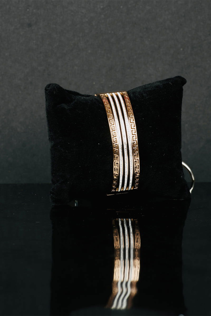 Copper metal finish bracelet with American Diamond stones and featuring a secure lock - Mayrake