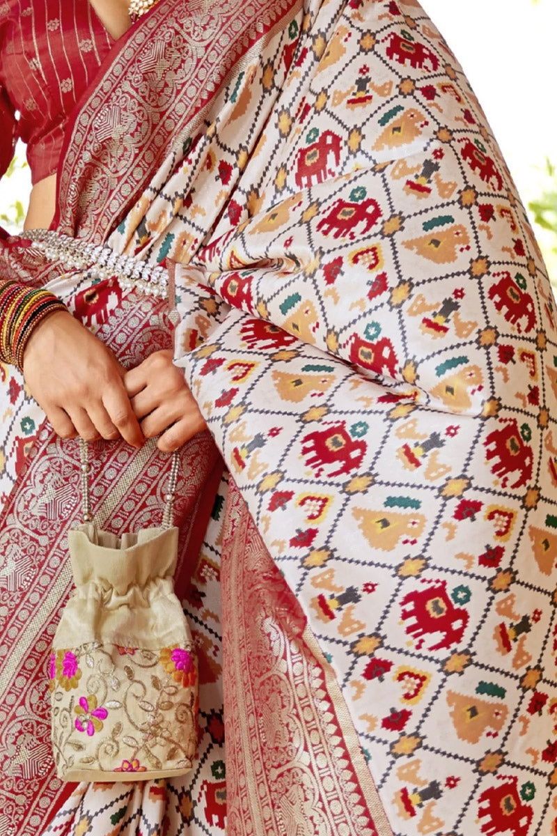 Cream-Red Viscose Silk Saree with Printed Patola Design - Mayrake.in