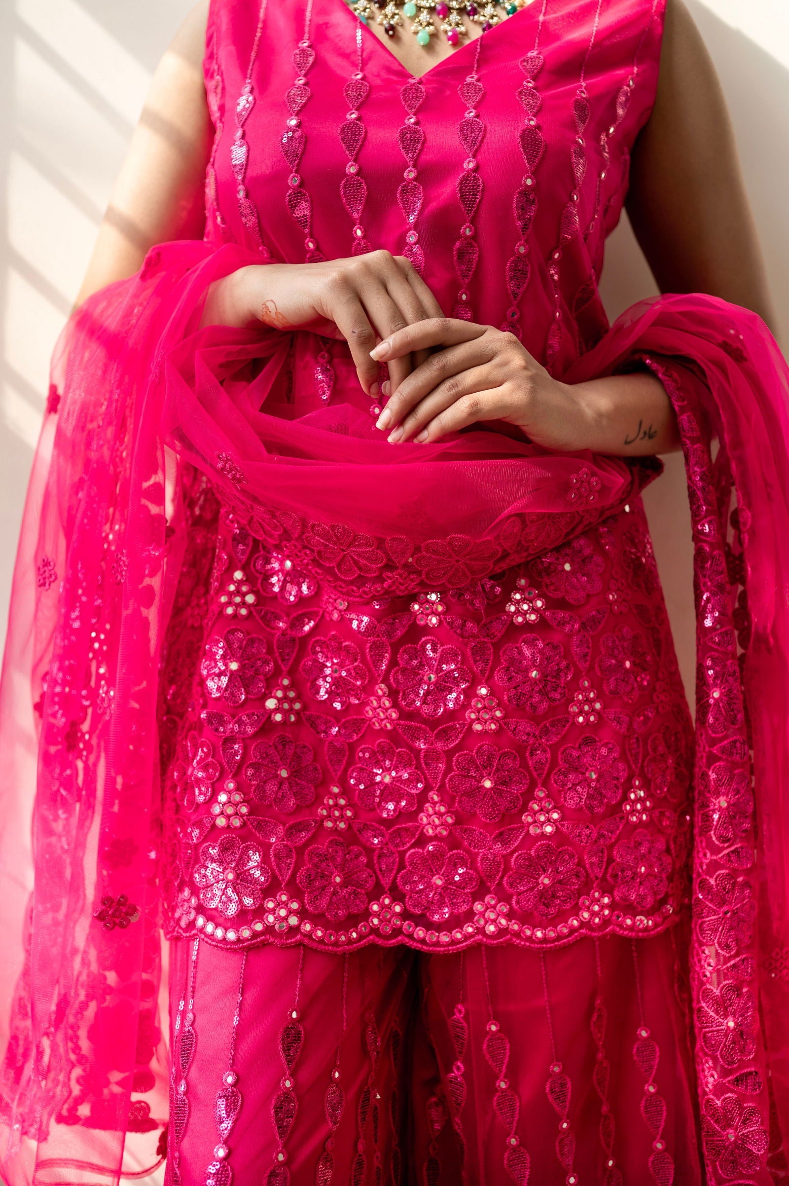 Fuchsia Pink Super Net Sleeveless Kurta with Flared Palazzo Set - Mayrake.in