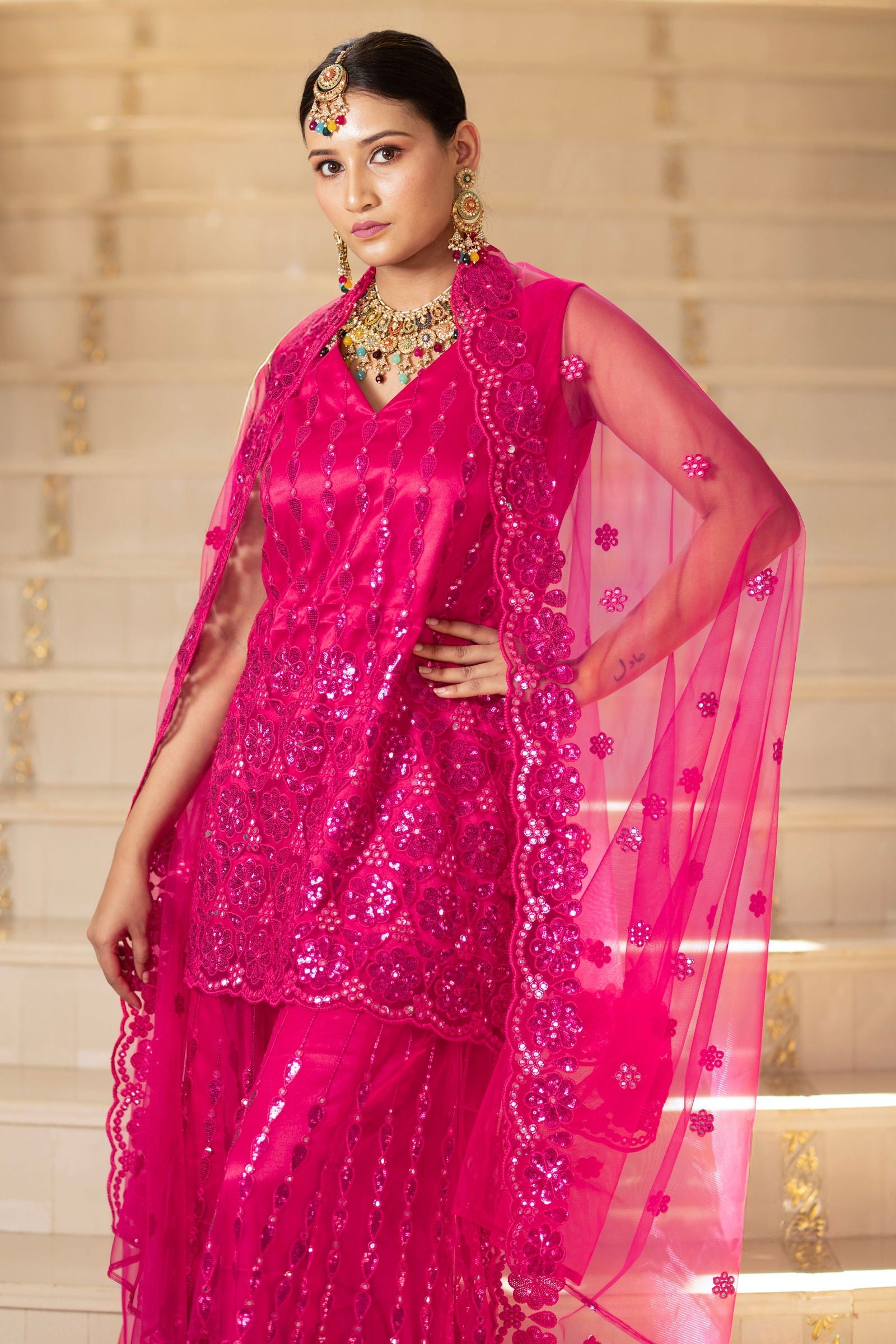 Fuchsia Pink Super Net Sleeveless Kurta with Flared Palazzo Set - Mayrake.in