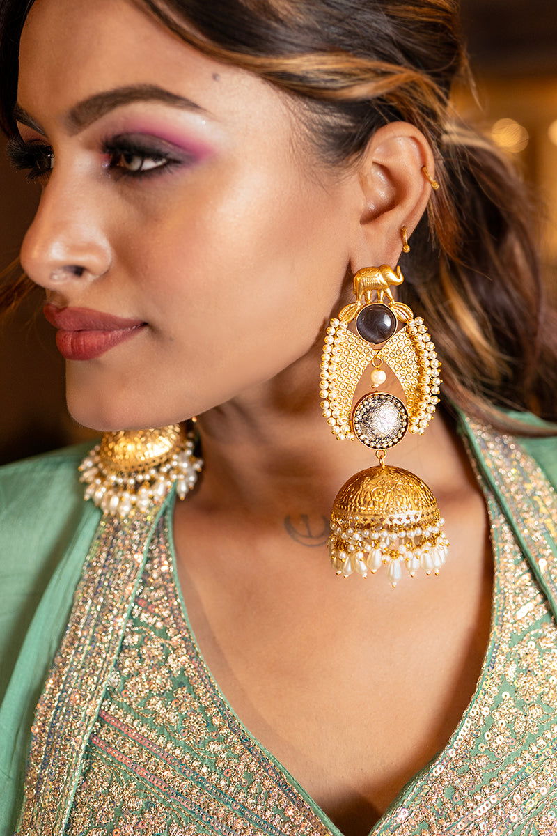Golden Jhumka Earrings with Pearls and Black Stone - Mayrake - 