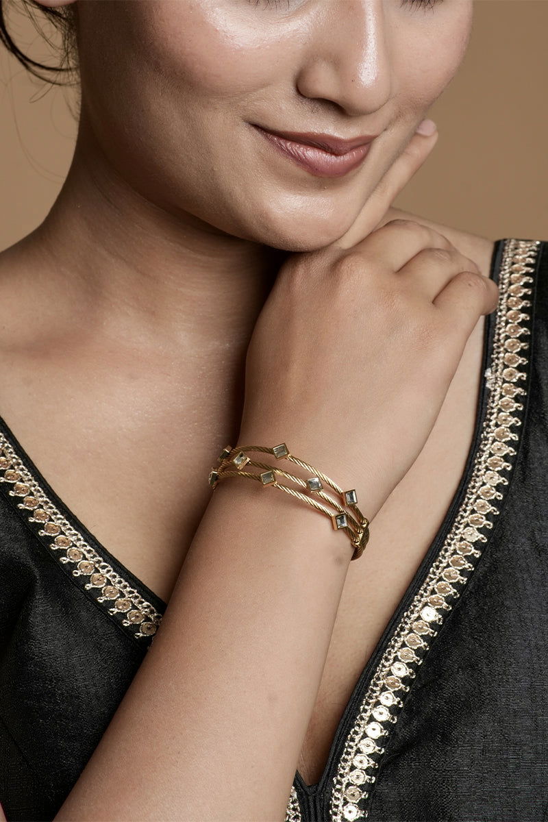 Golden layered metal bracelets with a stone link lock - Mayrake