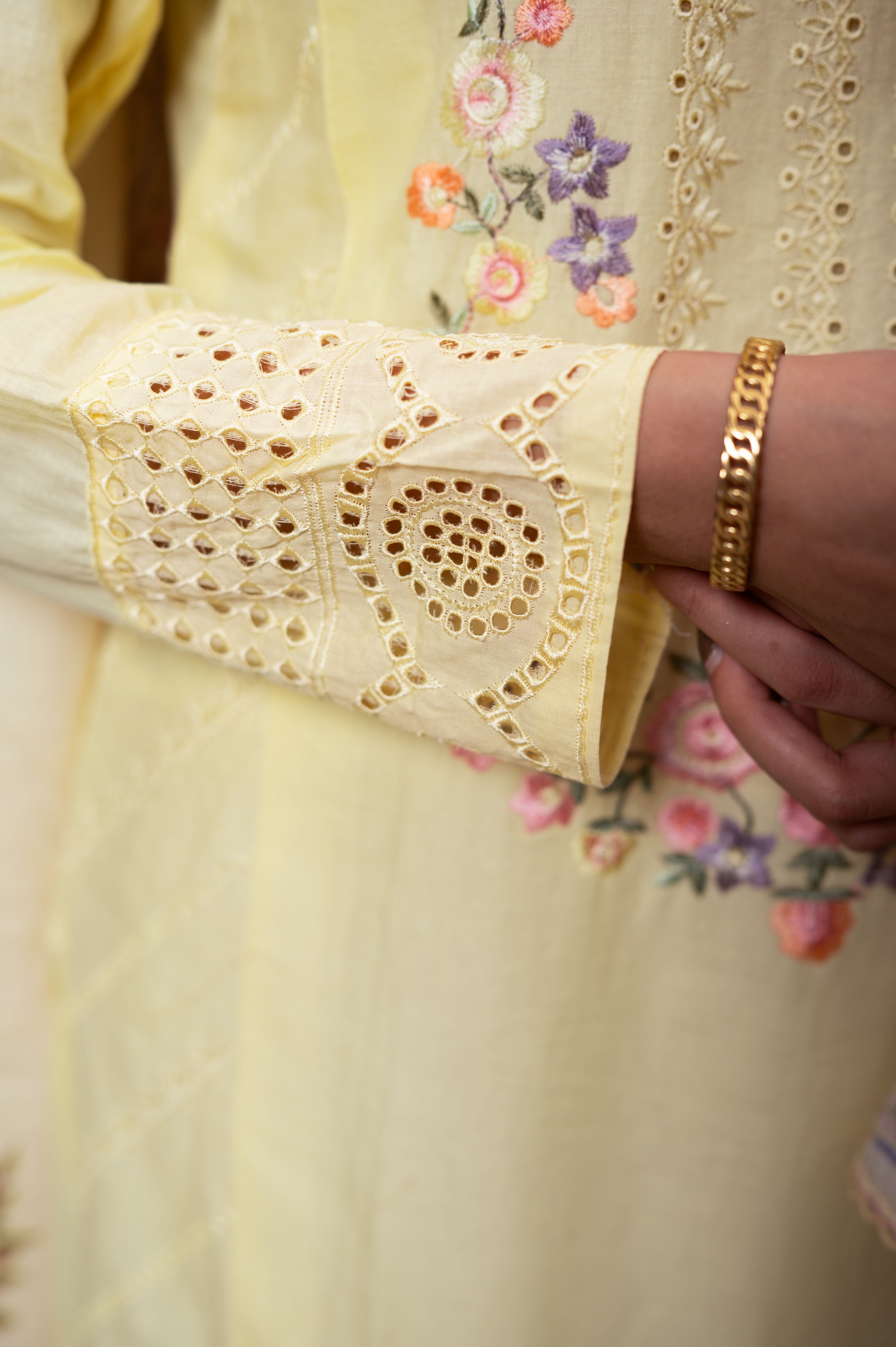 Lemon Yellow Cotton Suit with Embroidery with a Malmal Printed Dupatta