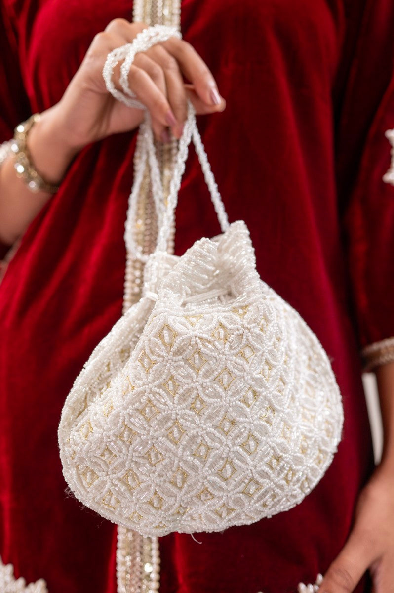 Milky White Potli with Pearl and Golden Thread Work